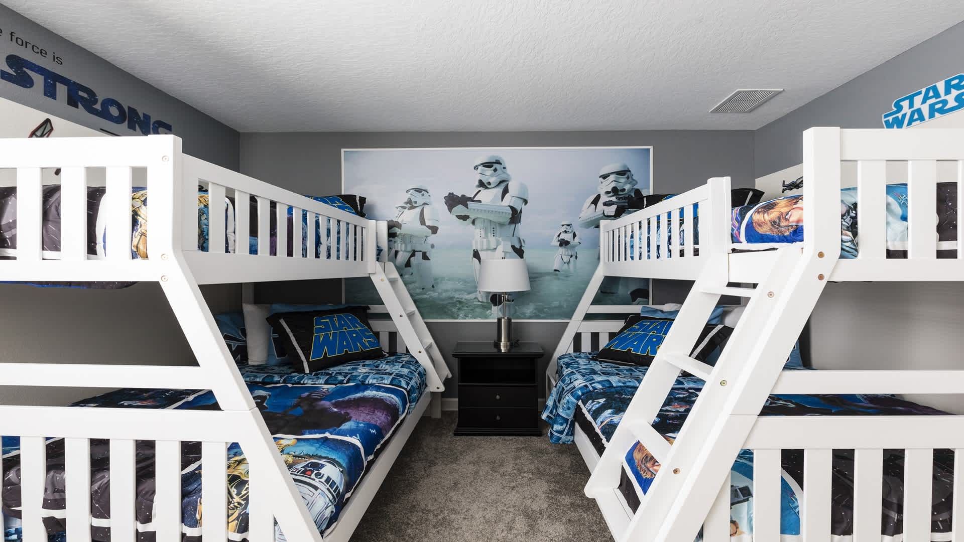 Star Wars themed bunk room with space for 6, perfect for young galaxy adventurers.