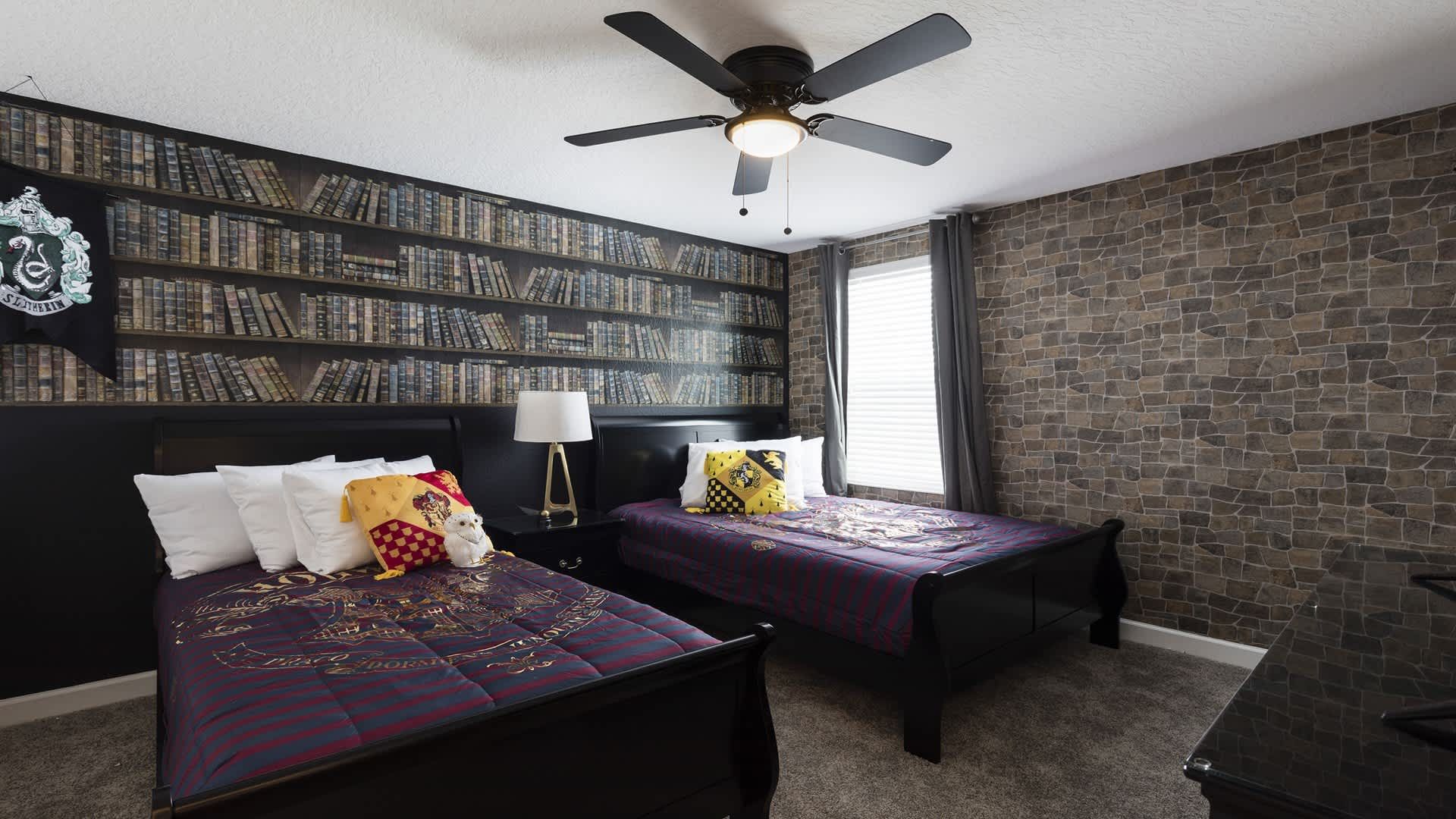 Magical themed room with twin beds, perfect for young wizards and dreamers.