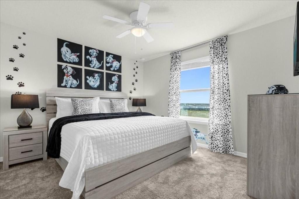 Charming 101 Dalmatians-themed bedroom with king bed and playful black-and-white decor.