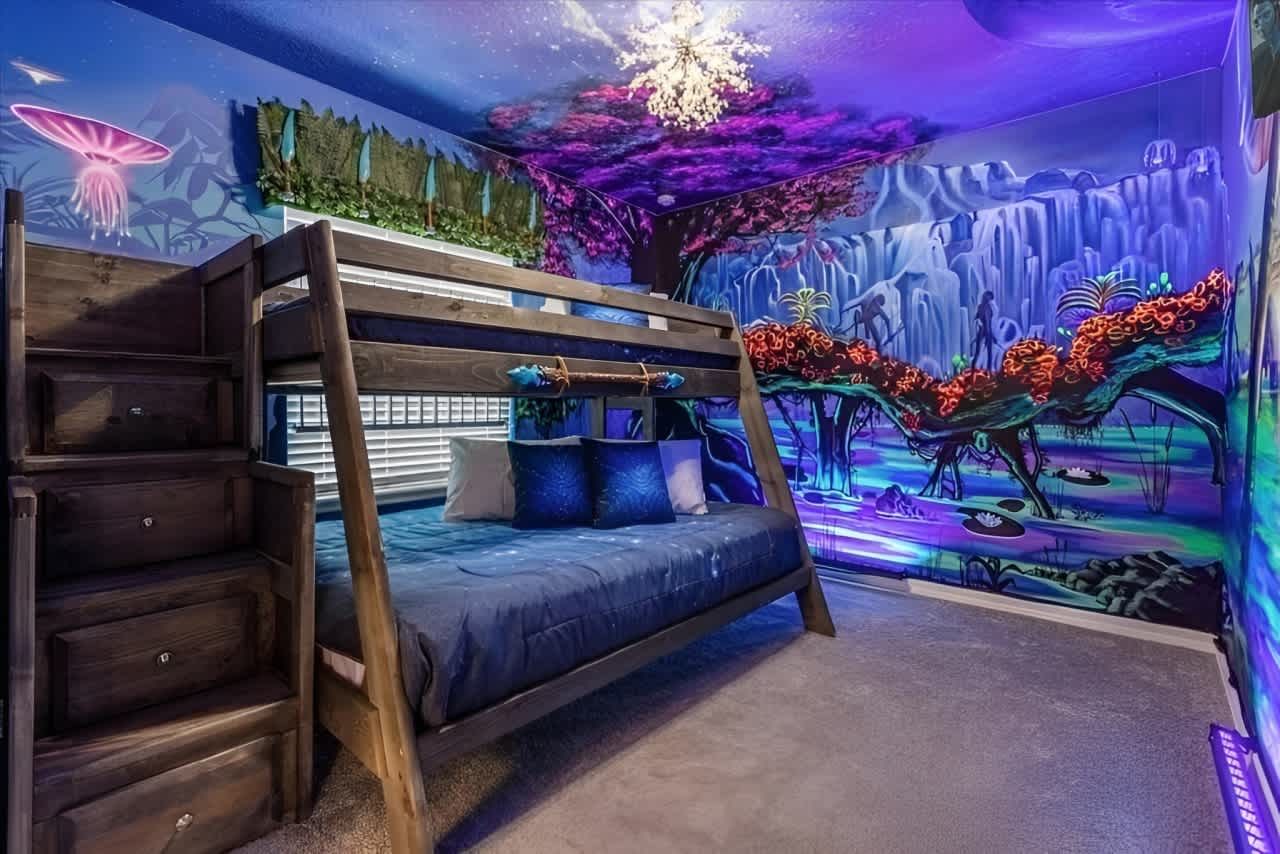 Immersive jungle-themed bunk room with glowing bioluminescent-style wall art.