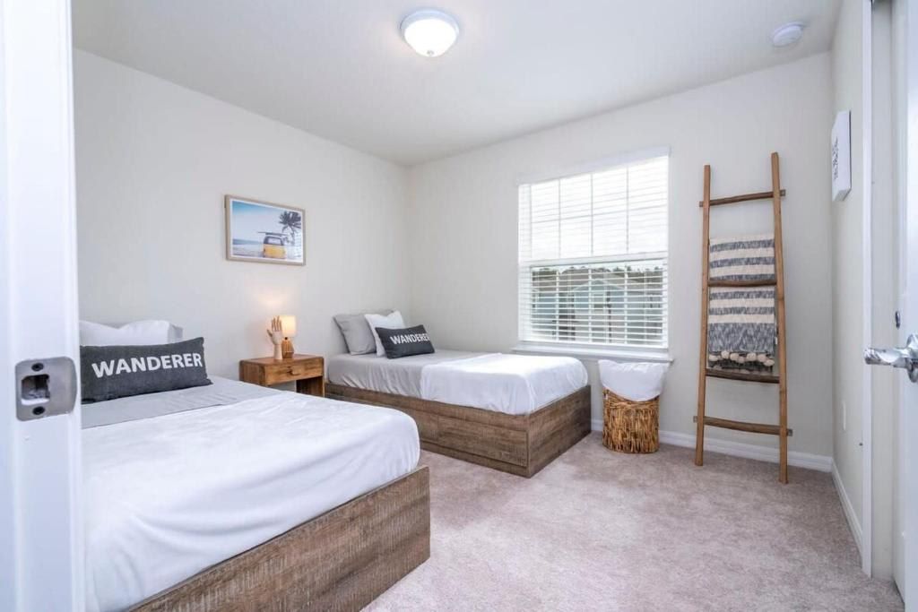 Cozy bedroom with natural light, perfect for a peaceful retreat or getaway.