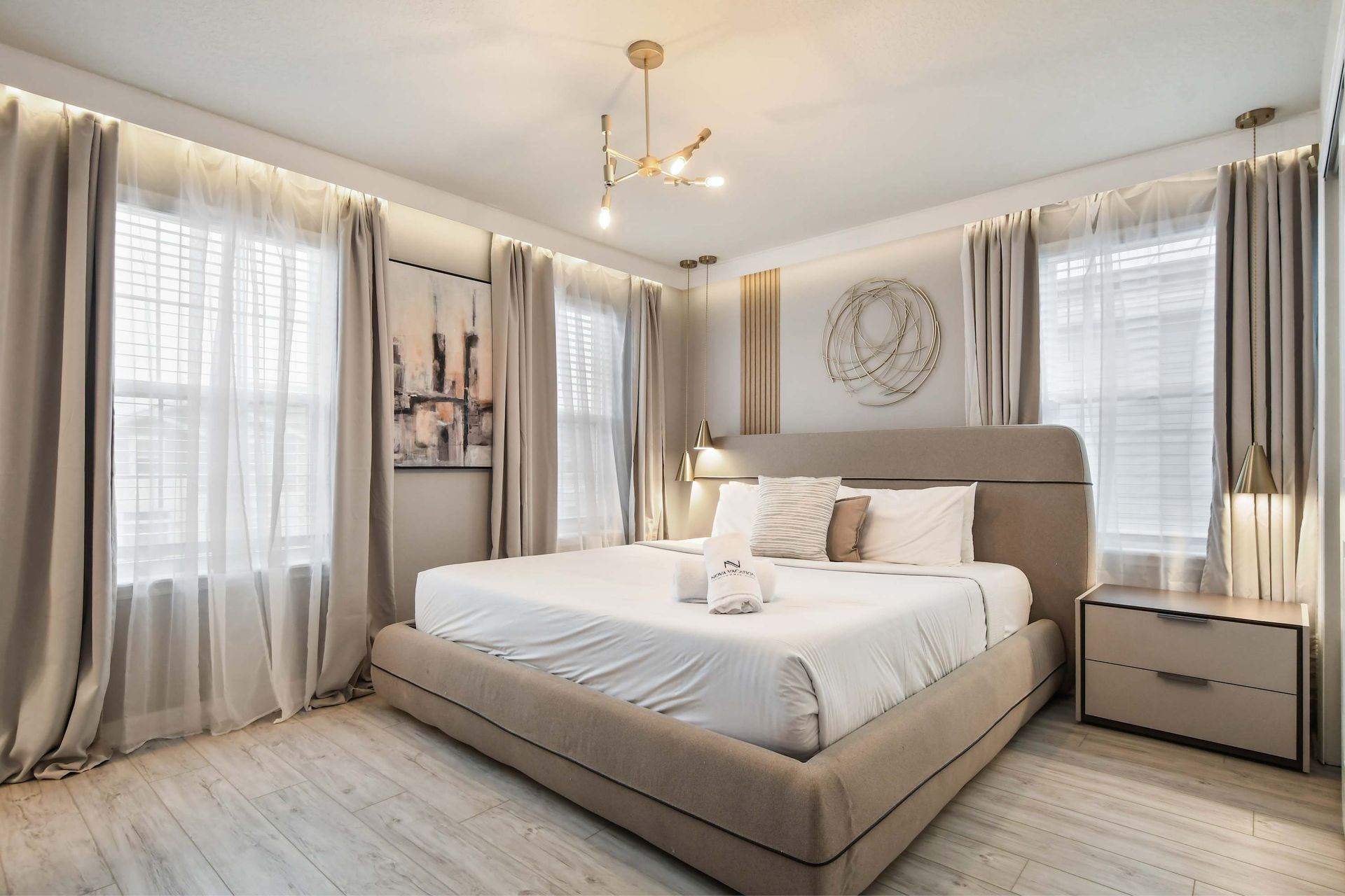 Serene bedroom retreat with king bed, soft neutral tones, and natural light.