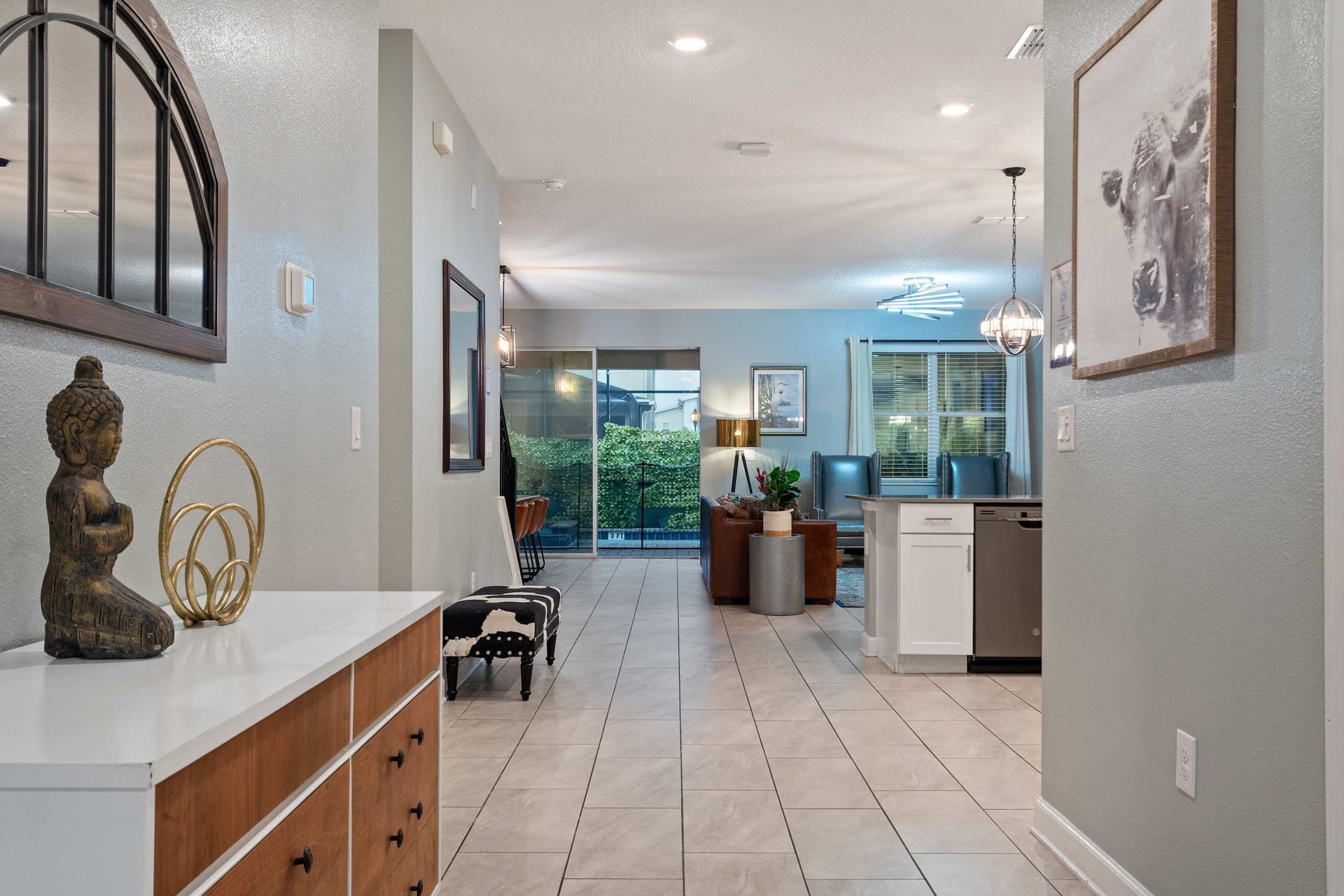 Welcoming entryway leads to a bright, open-concept living space with modern charm!
