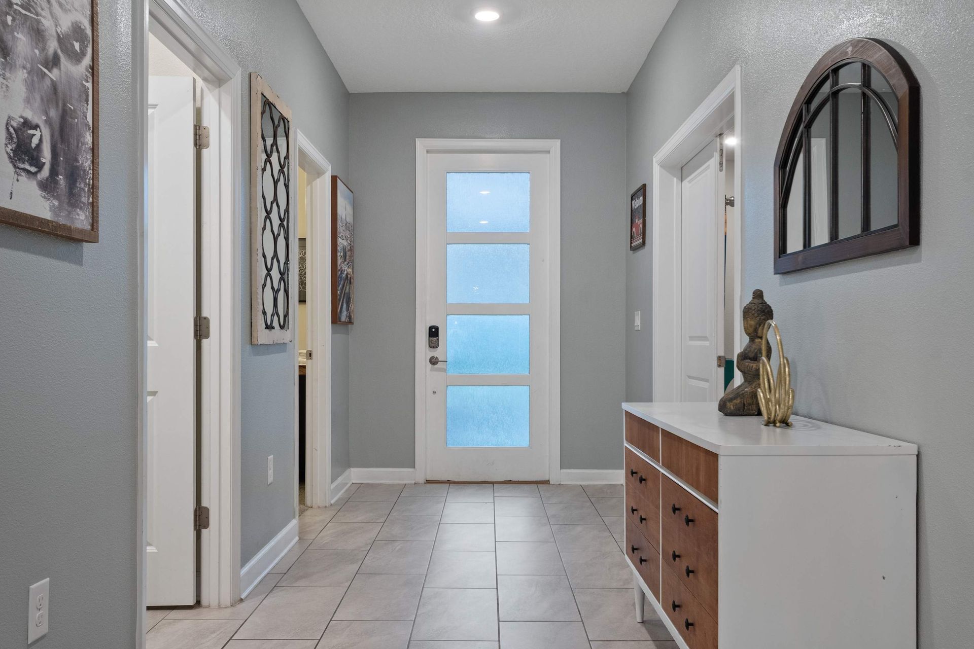 Bright and stylish entryway with modern décor, setting the tone for your stay!