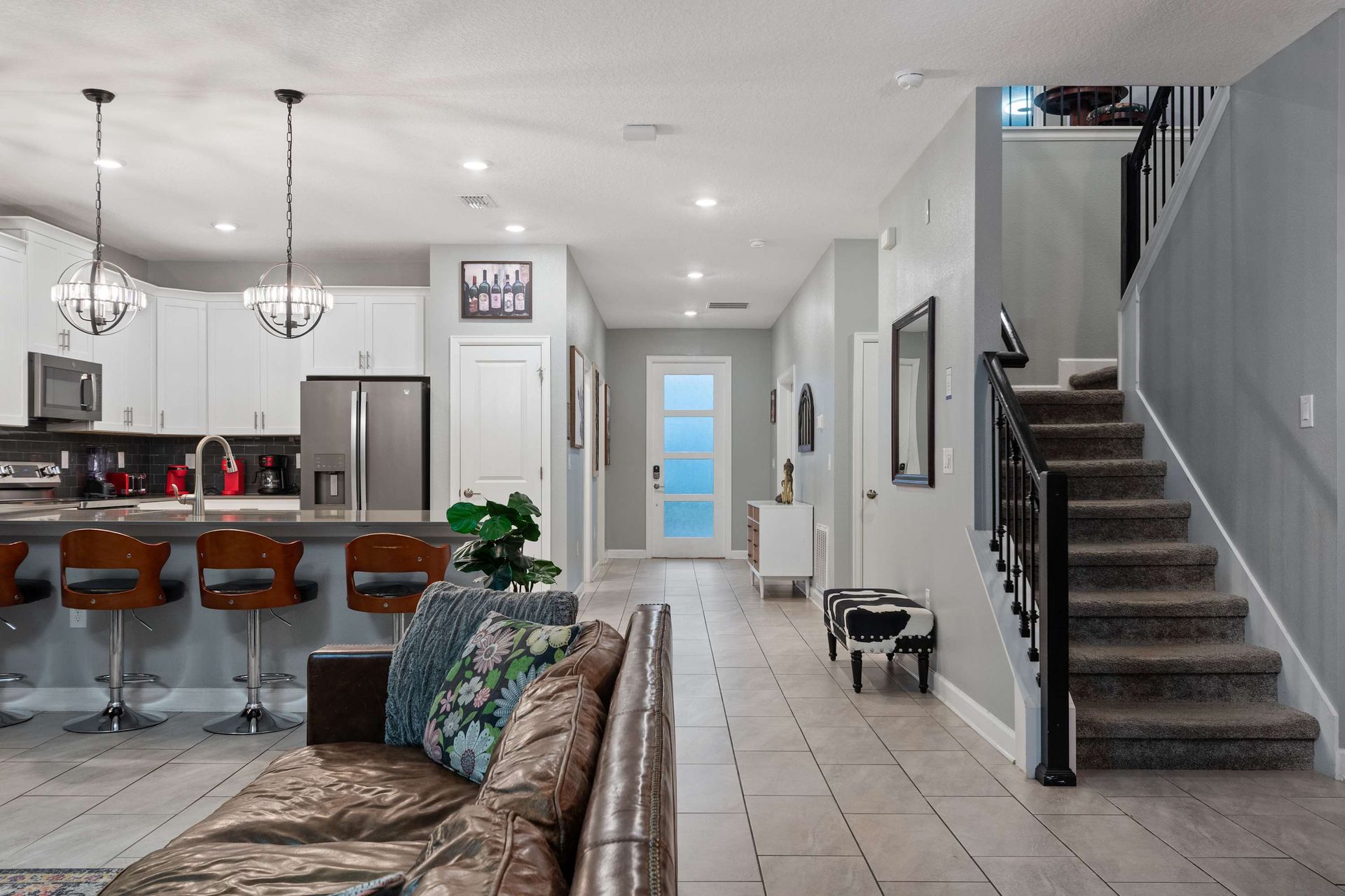 Modern comfort meets family-friendly design in this spacious, stylish open layout!