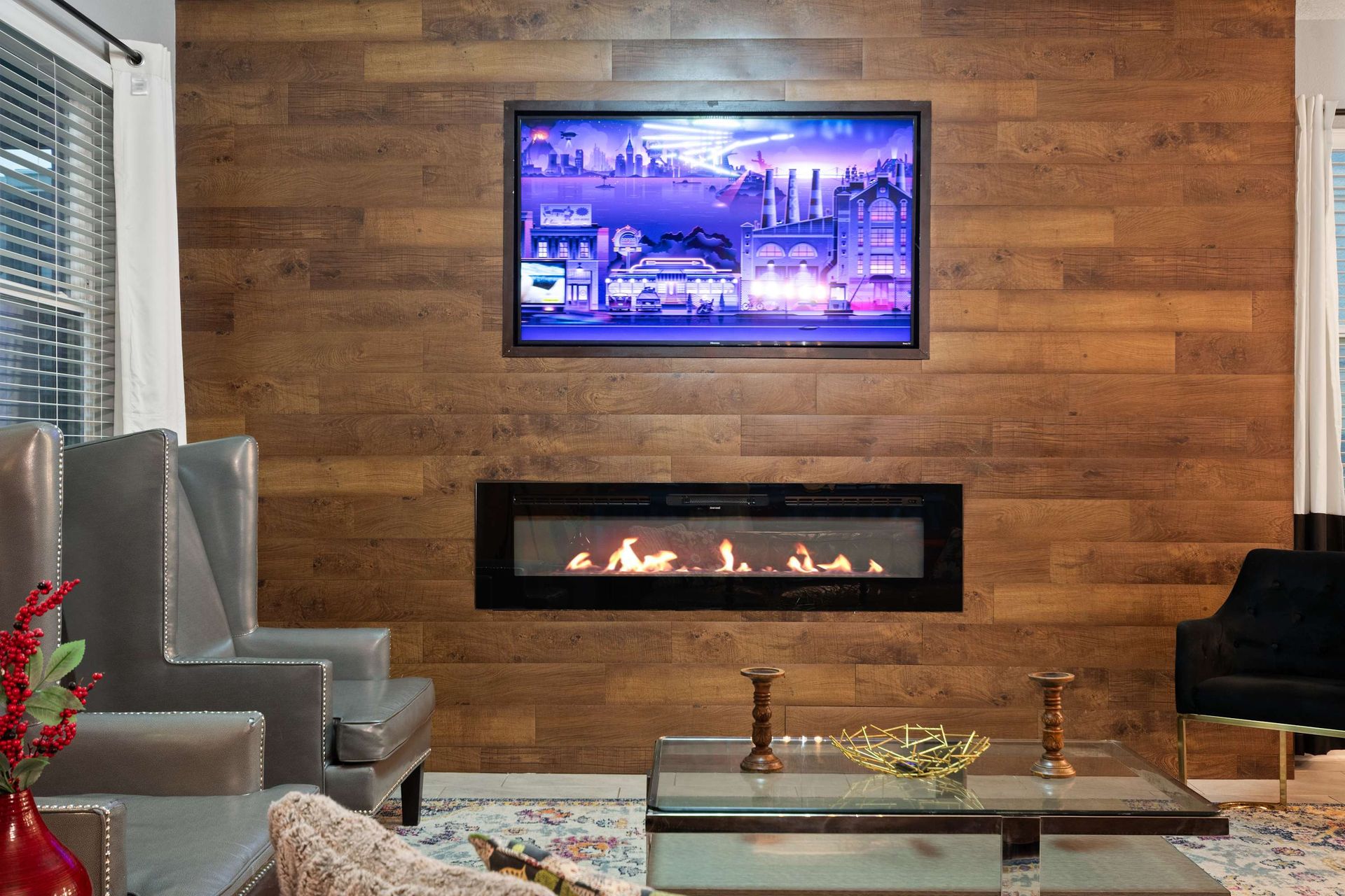 Chic fireplace feature wall with modern art, perfect for relaxing in style and comfort!