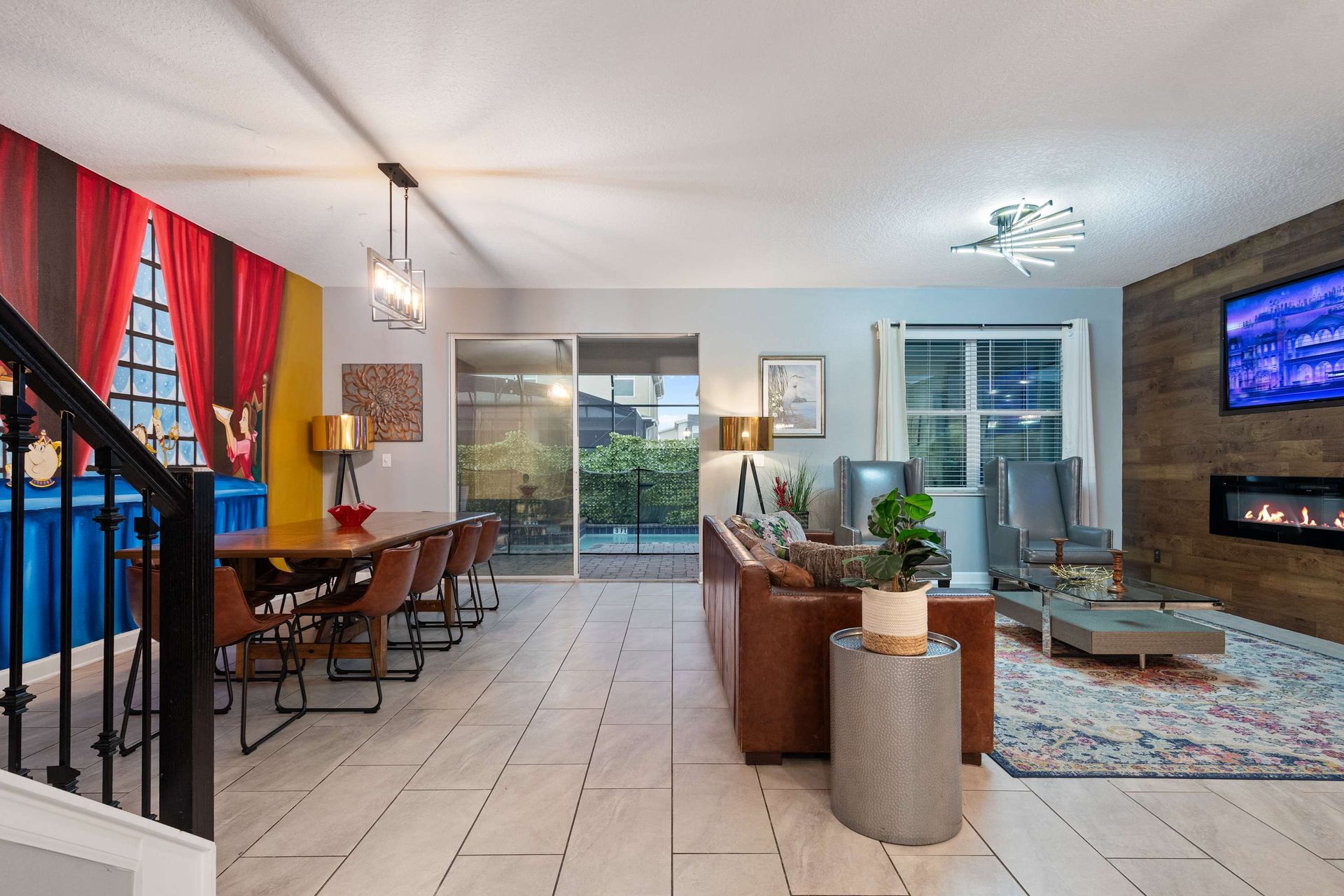 Spacious open-plan living with Disney charm, cozy fireplace, and stylish dining!