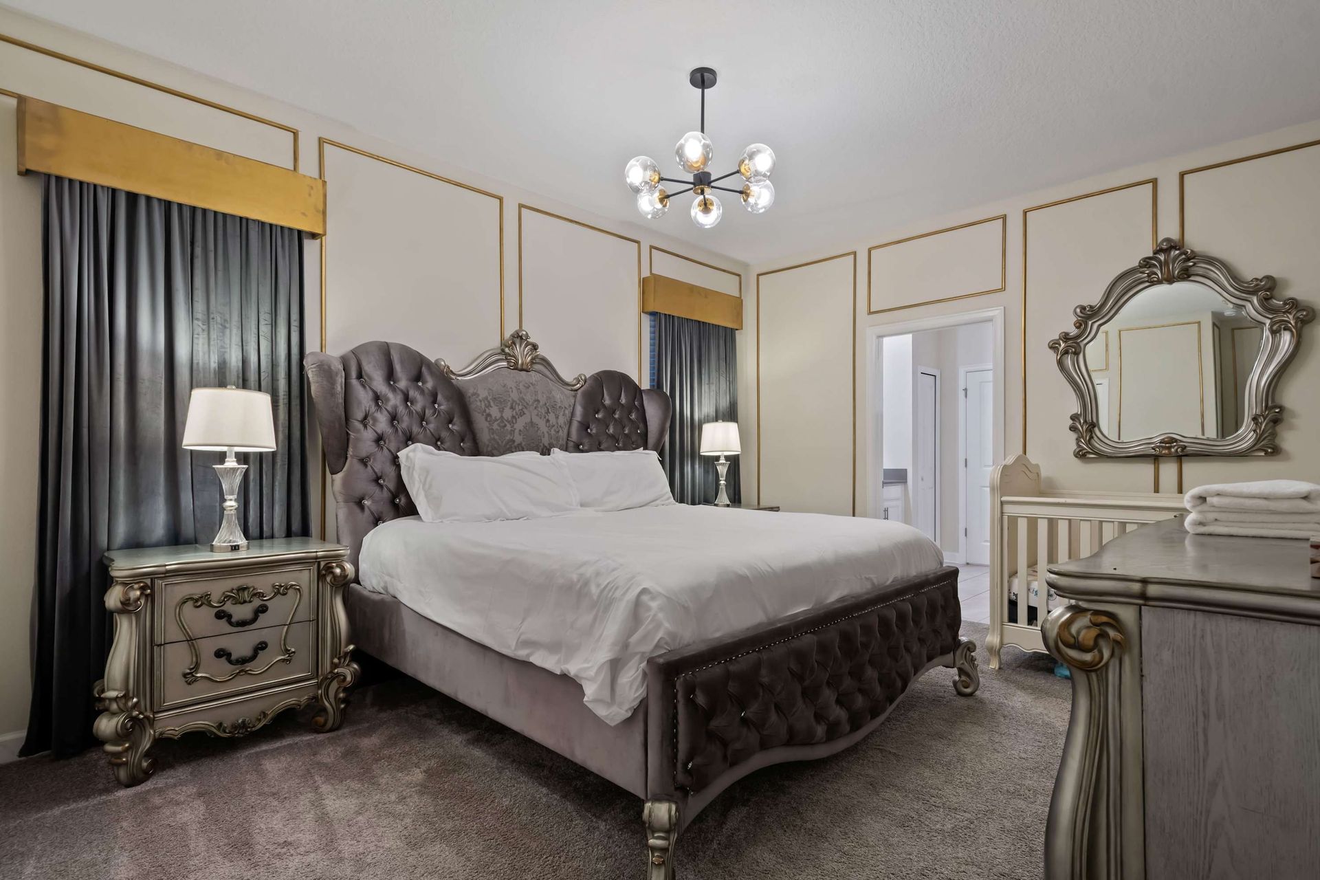 Sleep like royalty in this glamorous suite with elegant decor and a plush king bed!