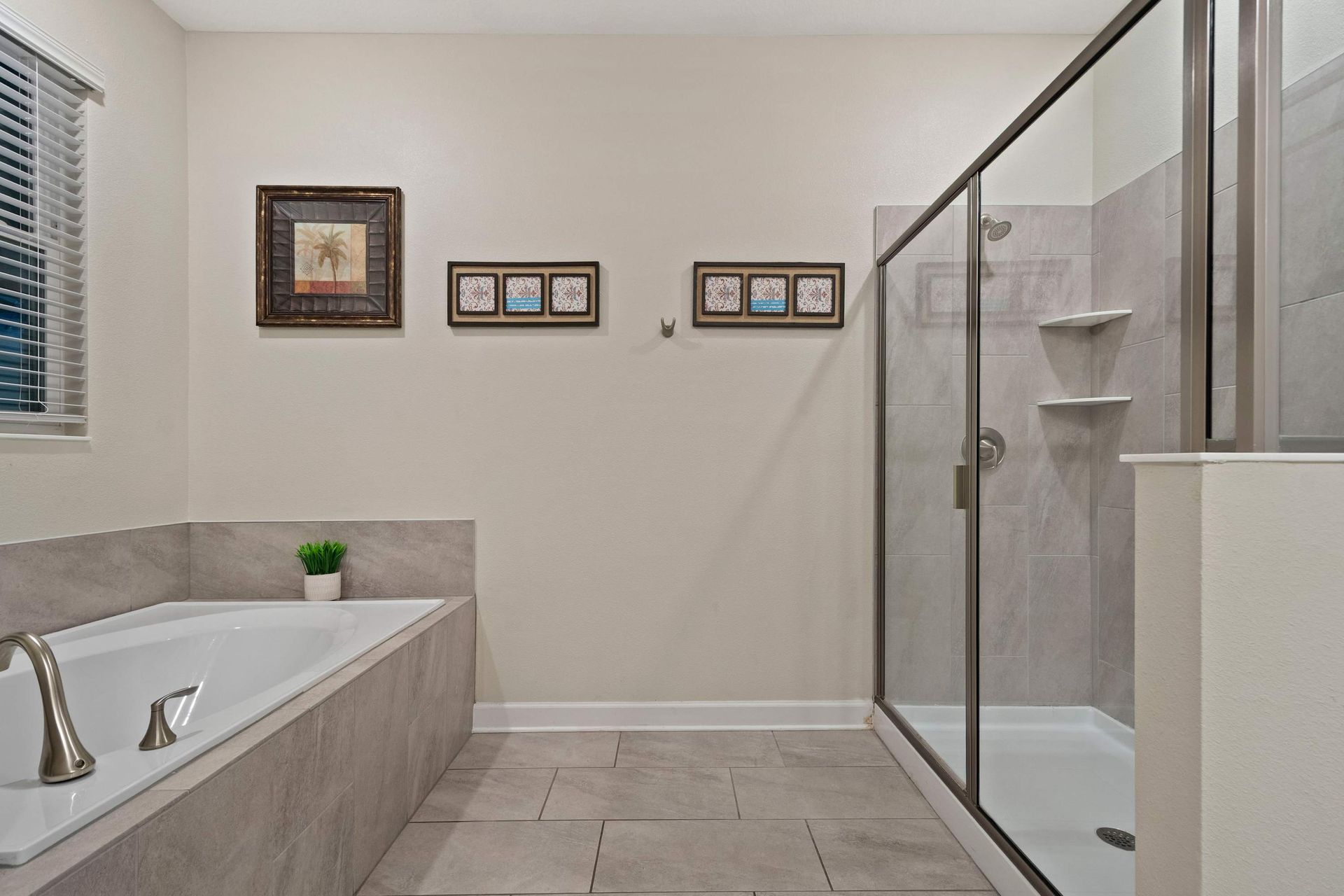 Relax and unwind in this spa-like bathroom with a soaking tub and walk-in shower!