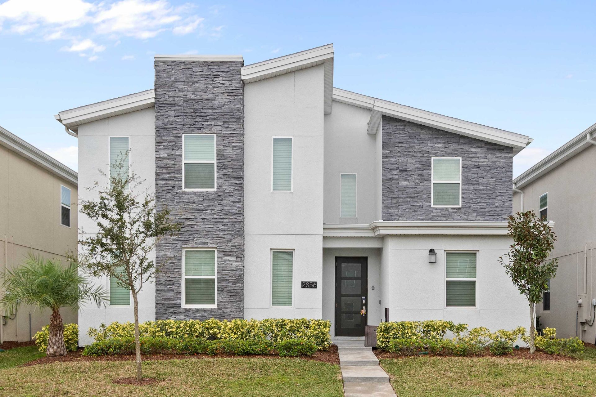 Modern two-story getaway with sleek design, spacious layout, and family-friendly charm!