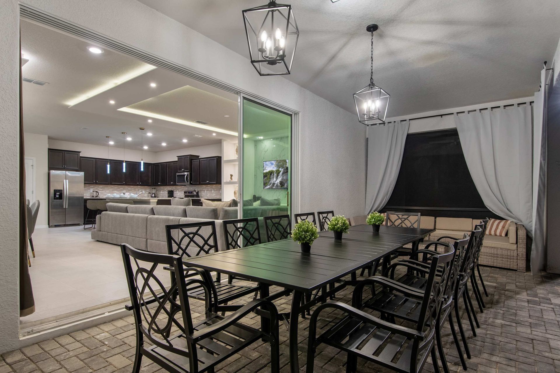 Elegant covered patio with dining for ten, perfect for entertaining and relaxing.