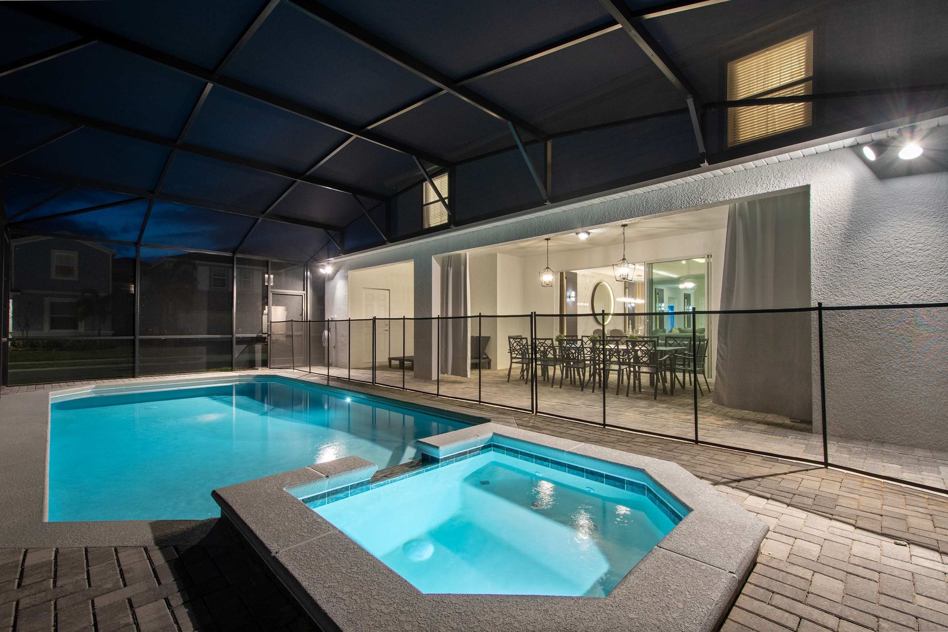 Relax in the private screened pool and spa, perfect for evenings under the lights.