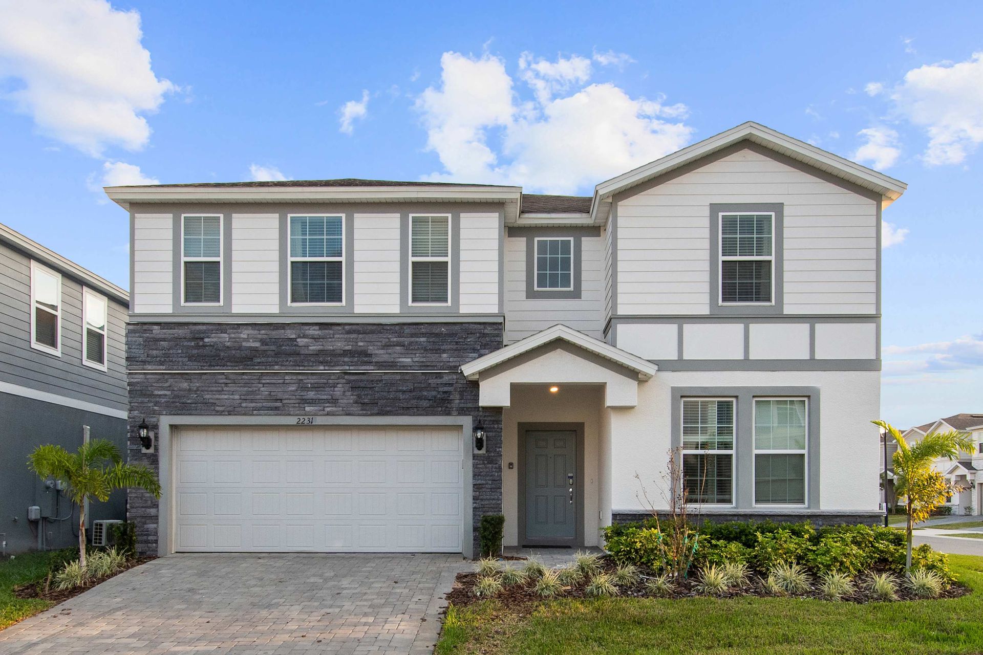 Modern two-story retreat with style, space, and curb appeal for unforgettable stays.