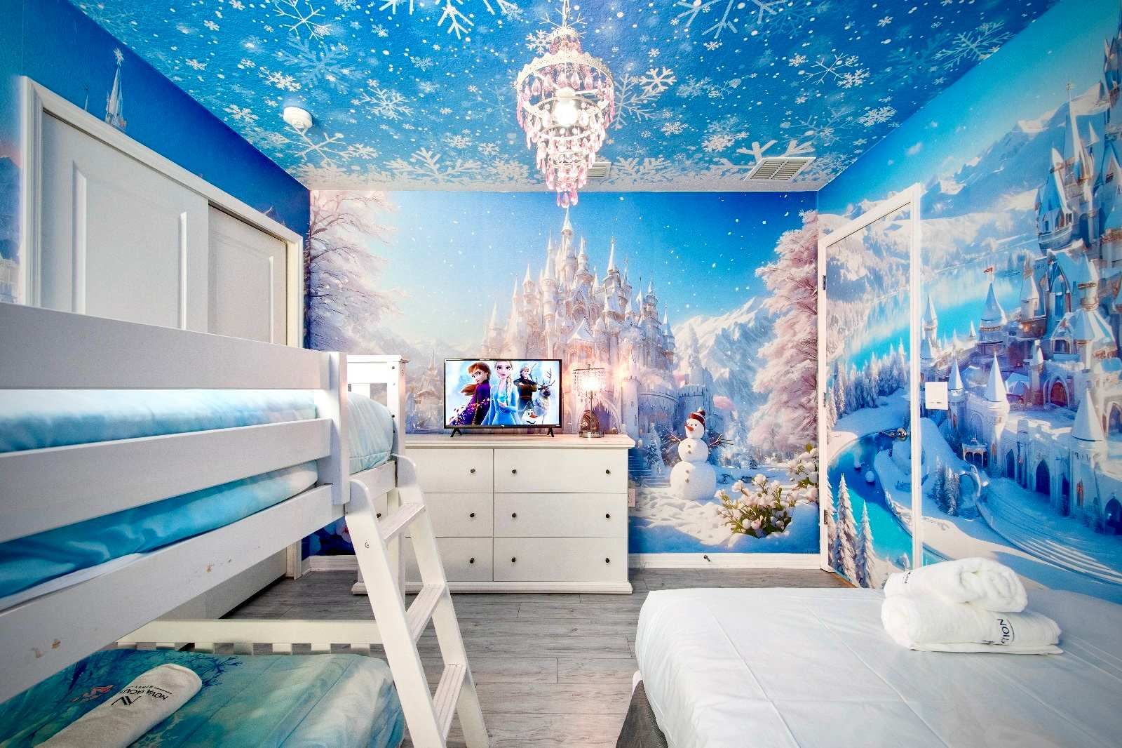 Enter a magical Frozen-themed bedroom with snowy castles and cozy icy charm.