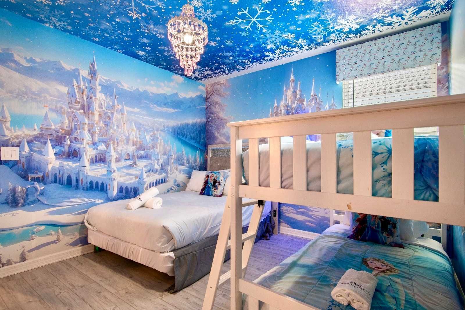 Enchanting Frozen-themed room with bunk beds and magical icy castle murals.