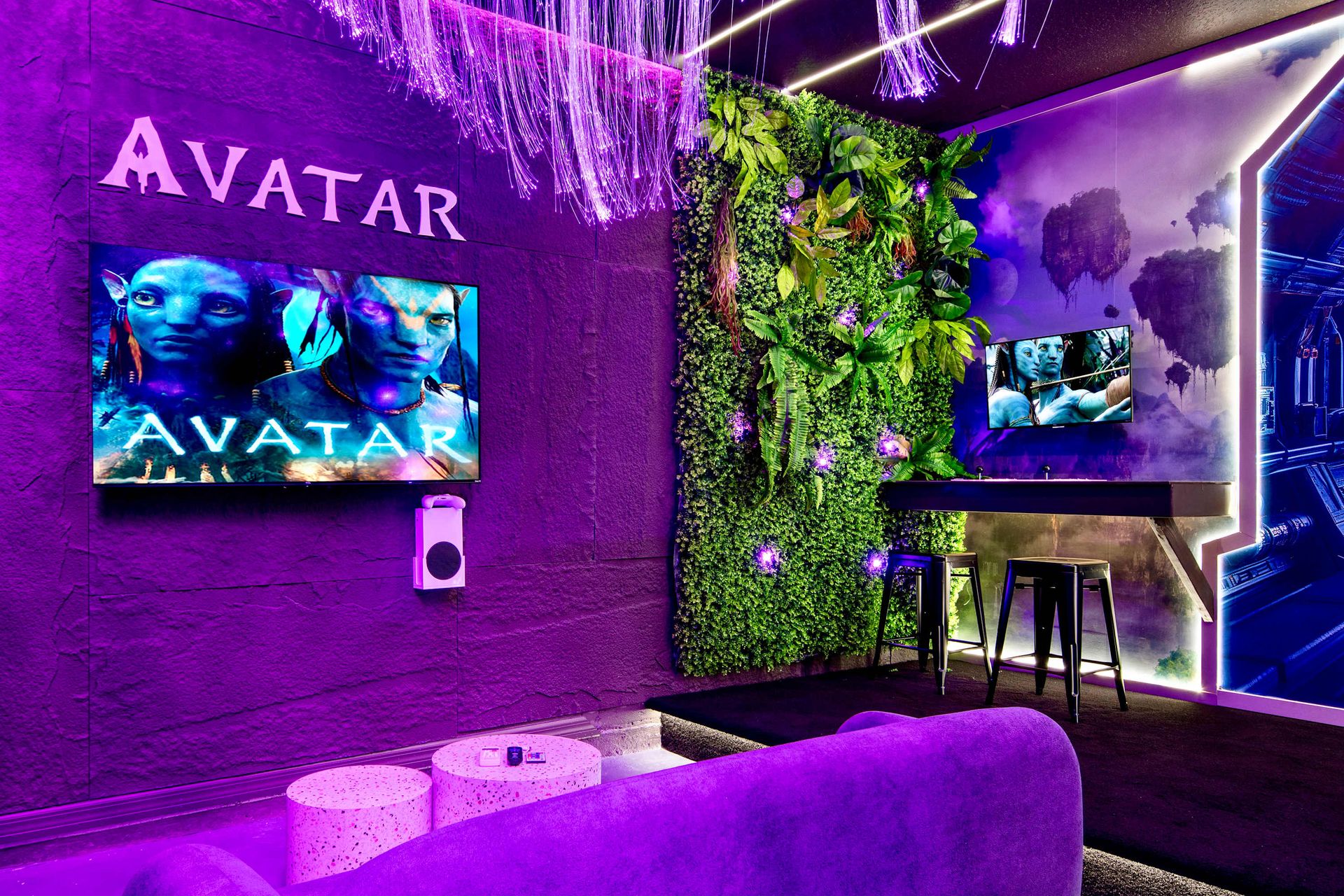 Immersive Avatar-inspired game room with foosball, arcade, and glowing vibes.