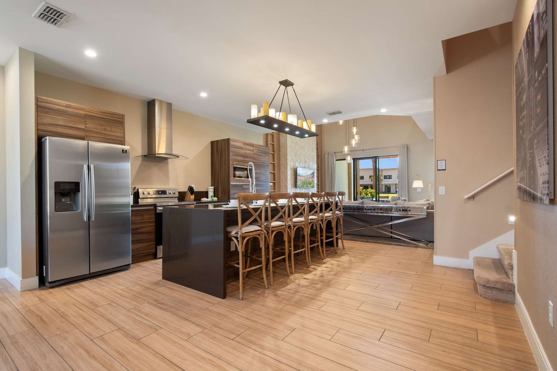 Spacious gourmet kitchen with large island, modern appliances, and open layout.
