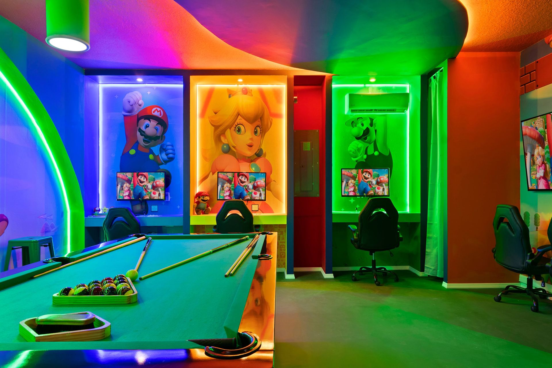 Colorful Super Mario game lounge with pool, arcades, and glowing neon vibes.
