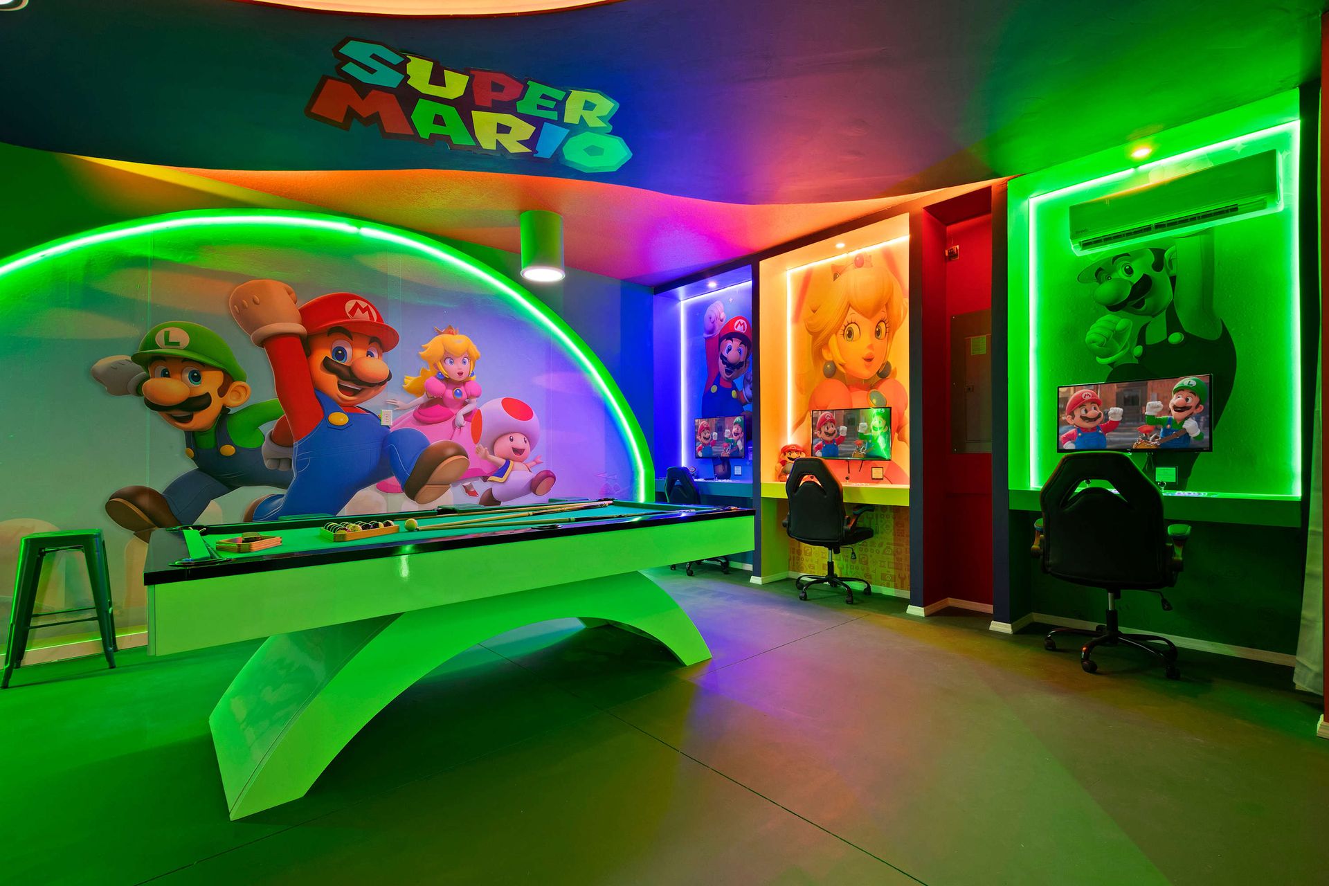 Epic Super Mario game room with neon lights, pool table, and gaming stations.
