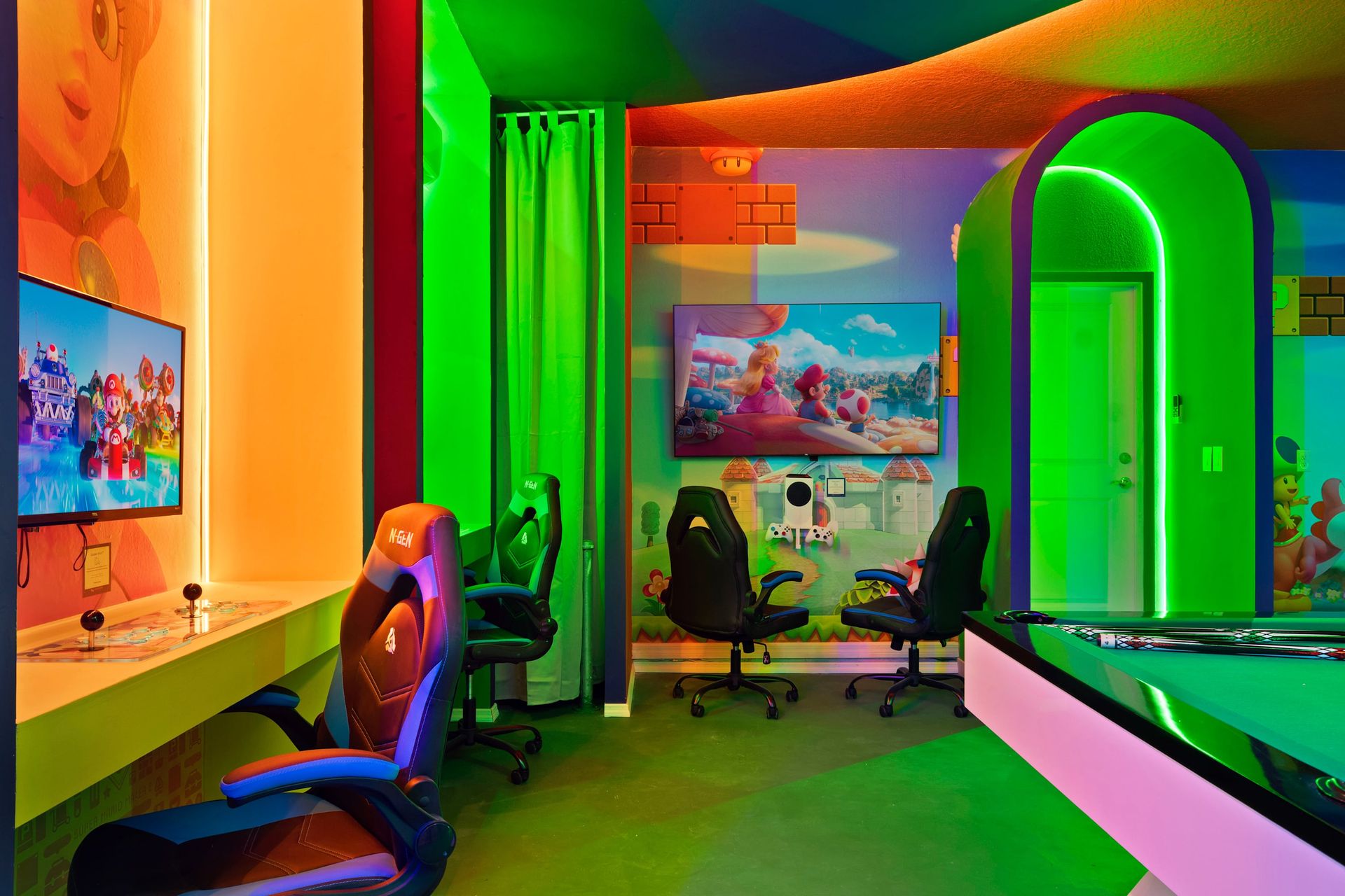 Vibrant Super Mario gaming den with dual screens, arcade chairs, and neon glow.
