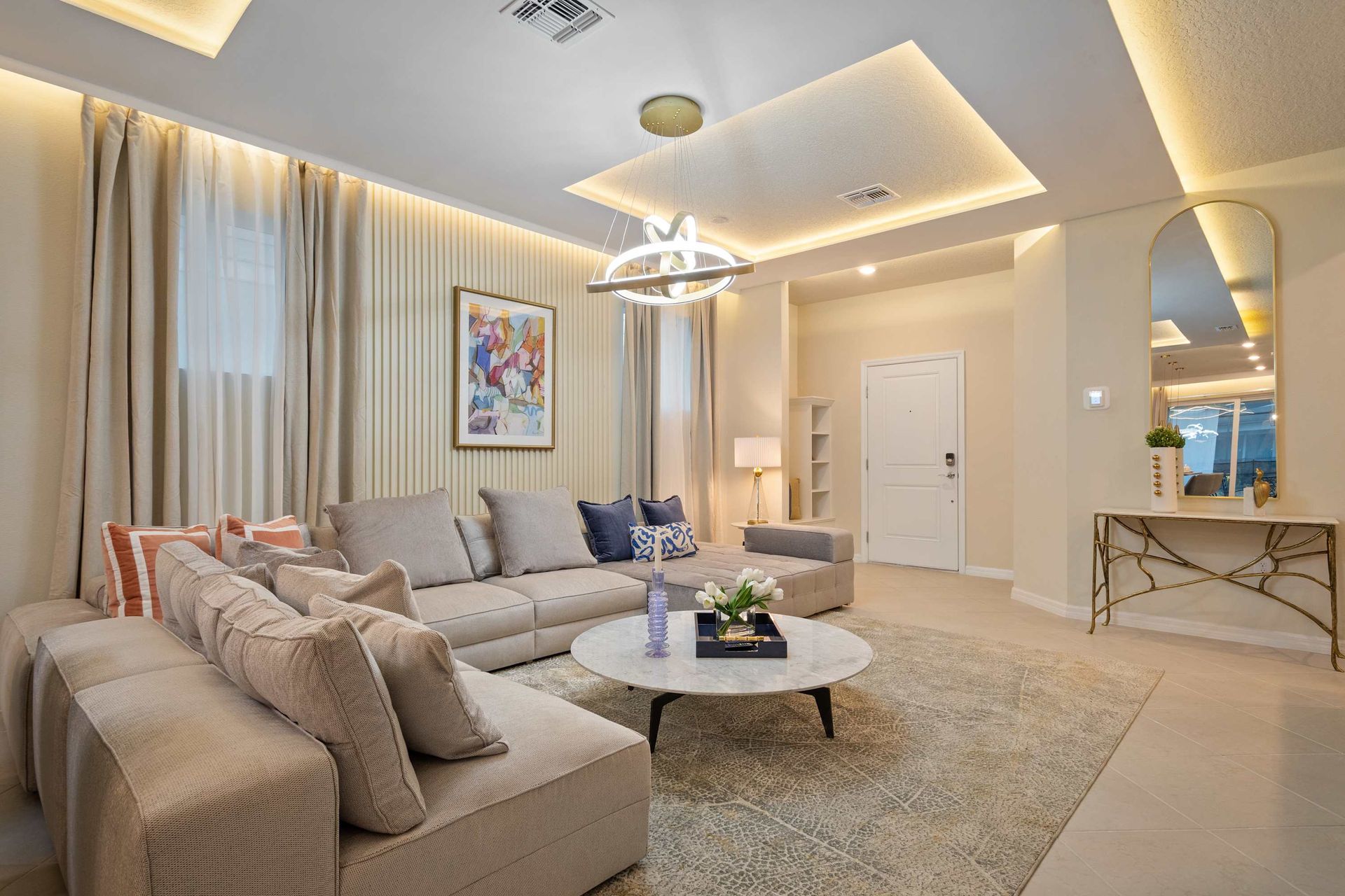 Stylish and serene living room with soft lighting, modern design, and comfort.
