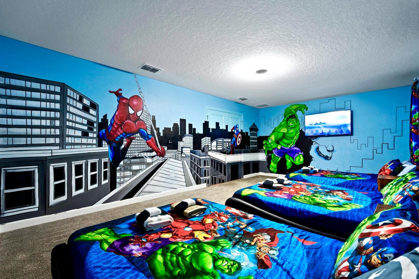 Sleep among superheroes in this action-packed, comic book-themed kids' room!