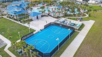 Versatile sports court for basketball, tennis, and pickleball fun!