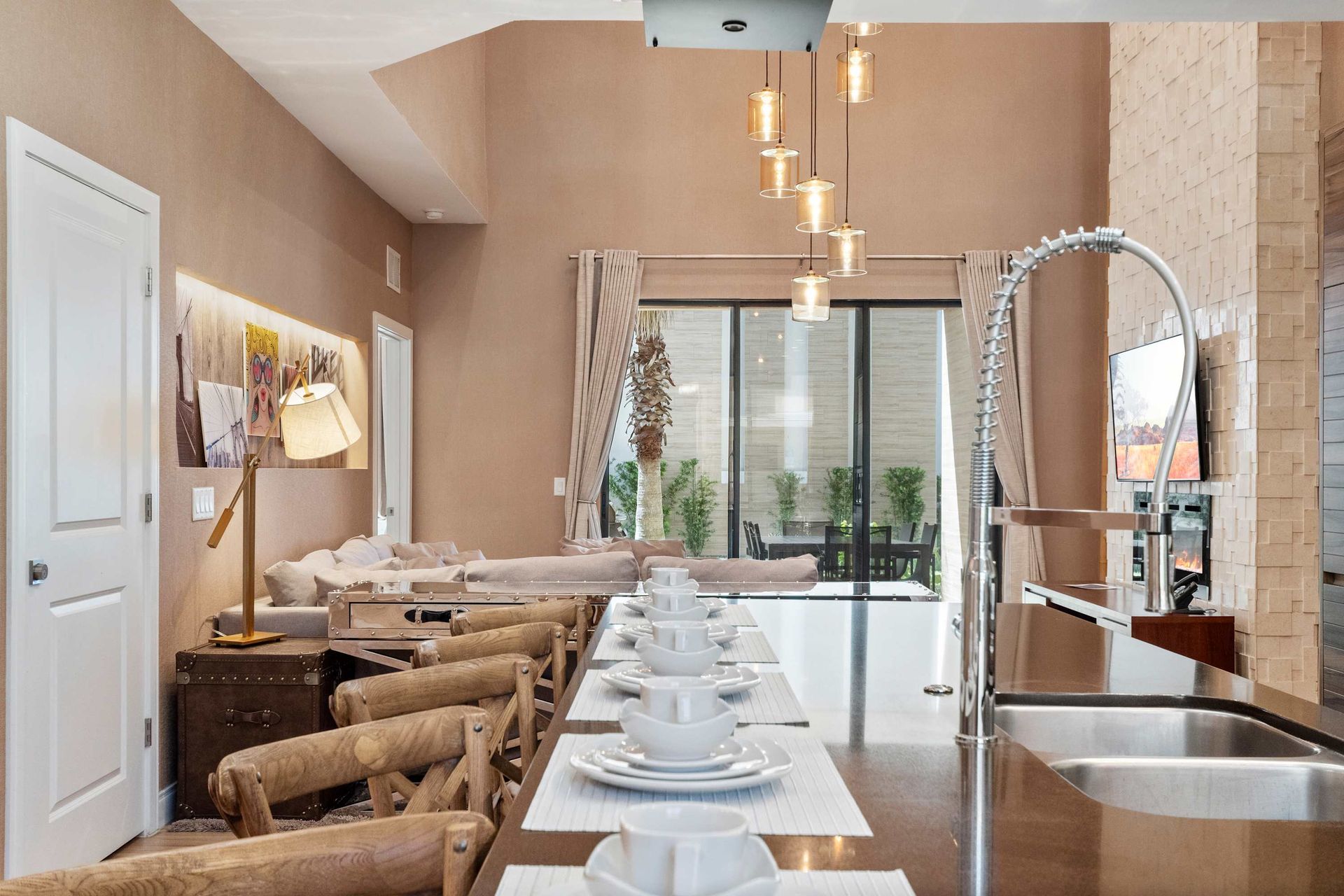 Spacious gourmet kitchen with large island, modern appliances, and open layout.