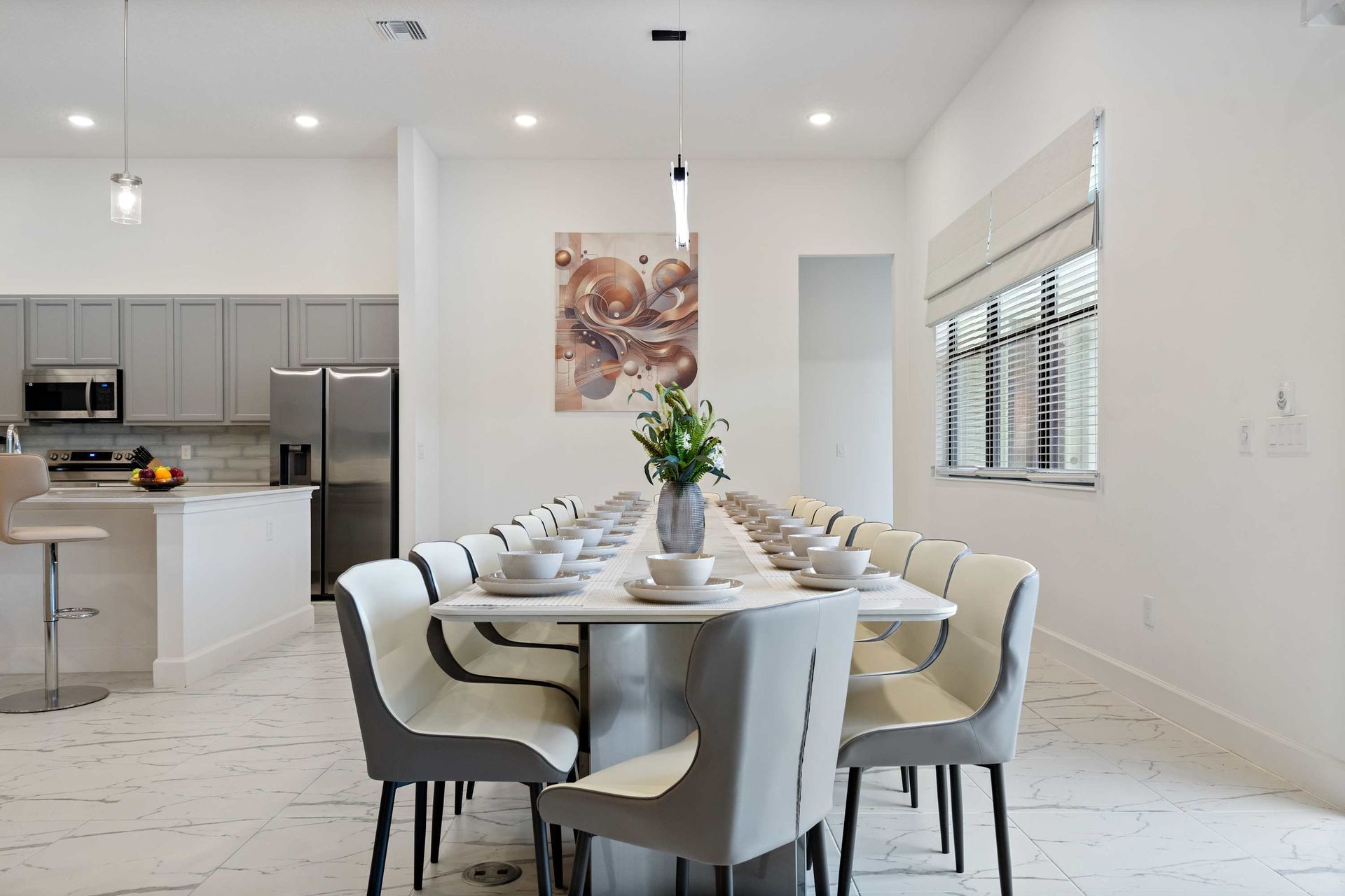 Elegant dining area with seating for 16, perfect for group meals and gatherings

