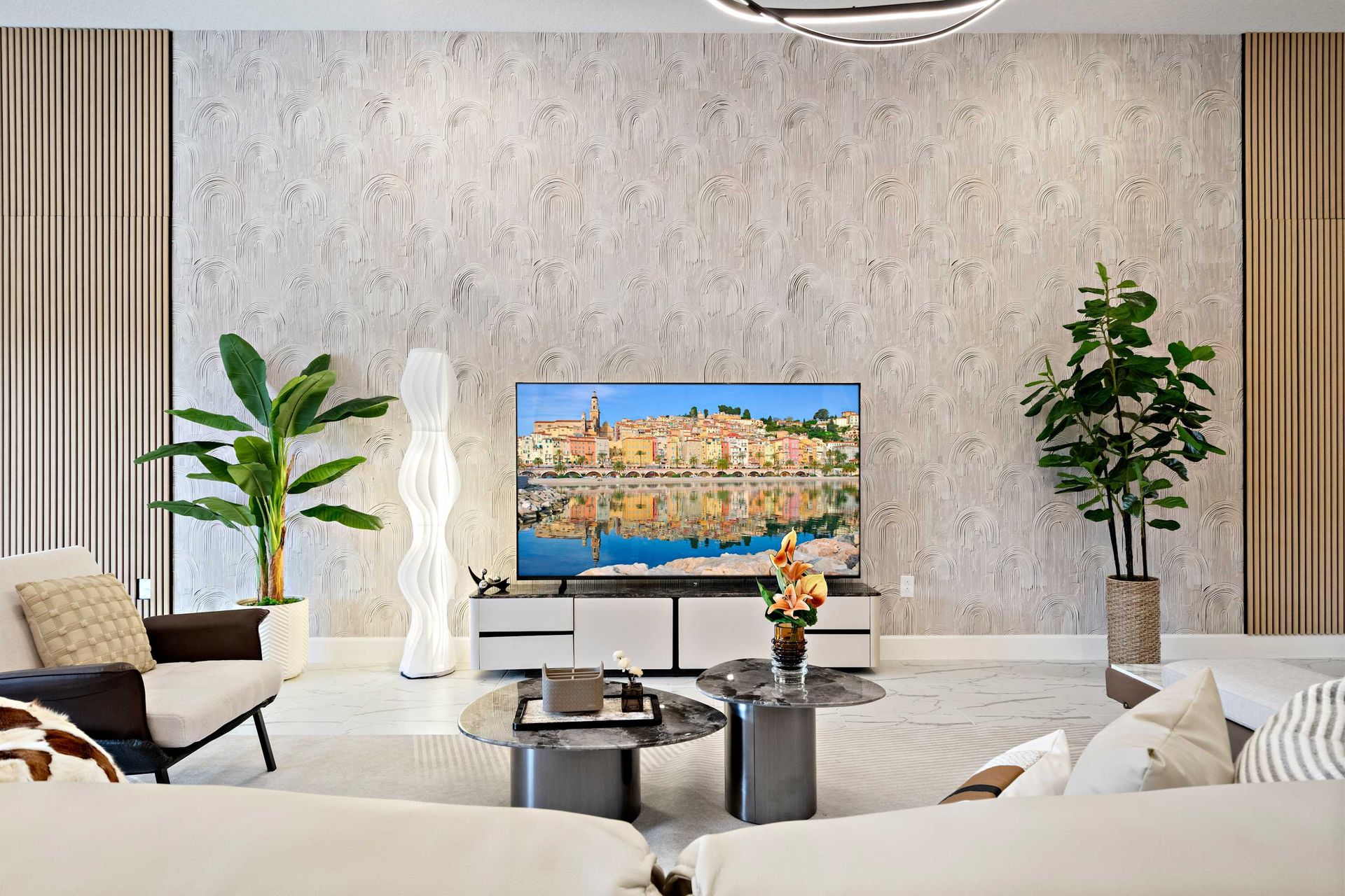 Chic lounge with designer touches, large smart TV, and a stylish modern vibe
