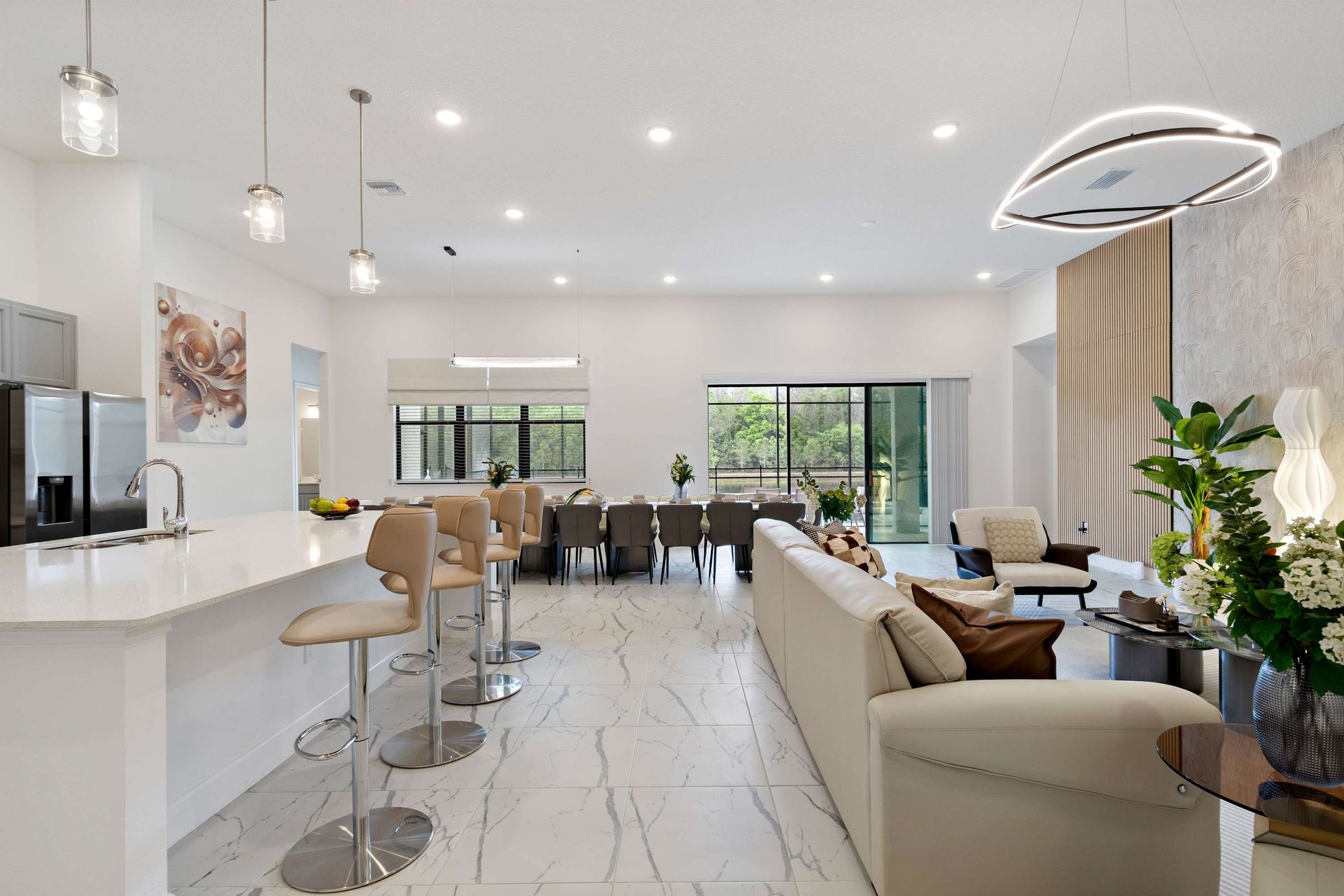 Bright and airy open-plan space with modern kitchen, dining for 16, and luxe seating
