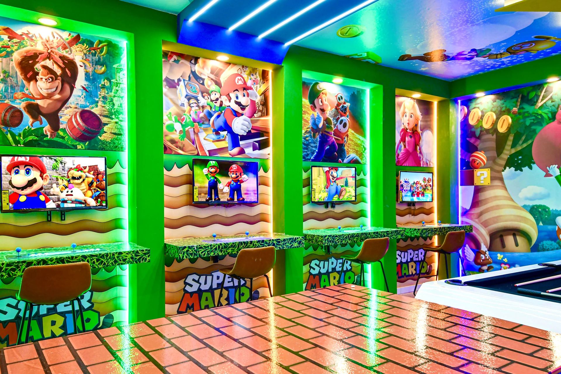 Super Mario arcade room with gaming stations, bold lighting, and playful decor!
