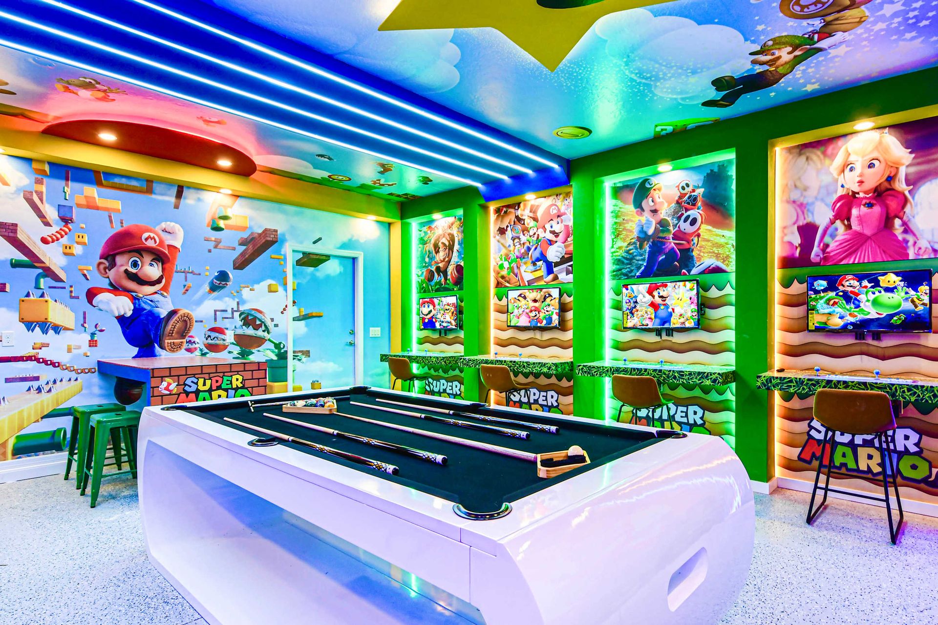 Epic Super Mario game room with arcade setups, pool table, and neon lights!
