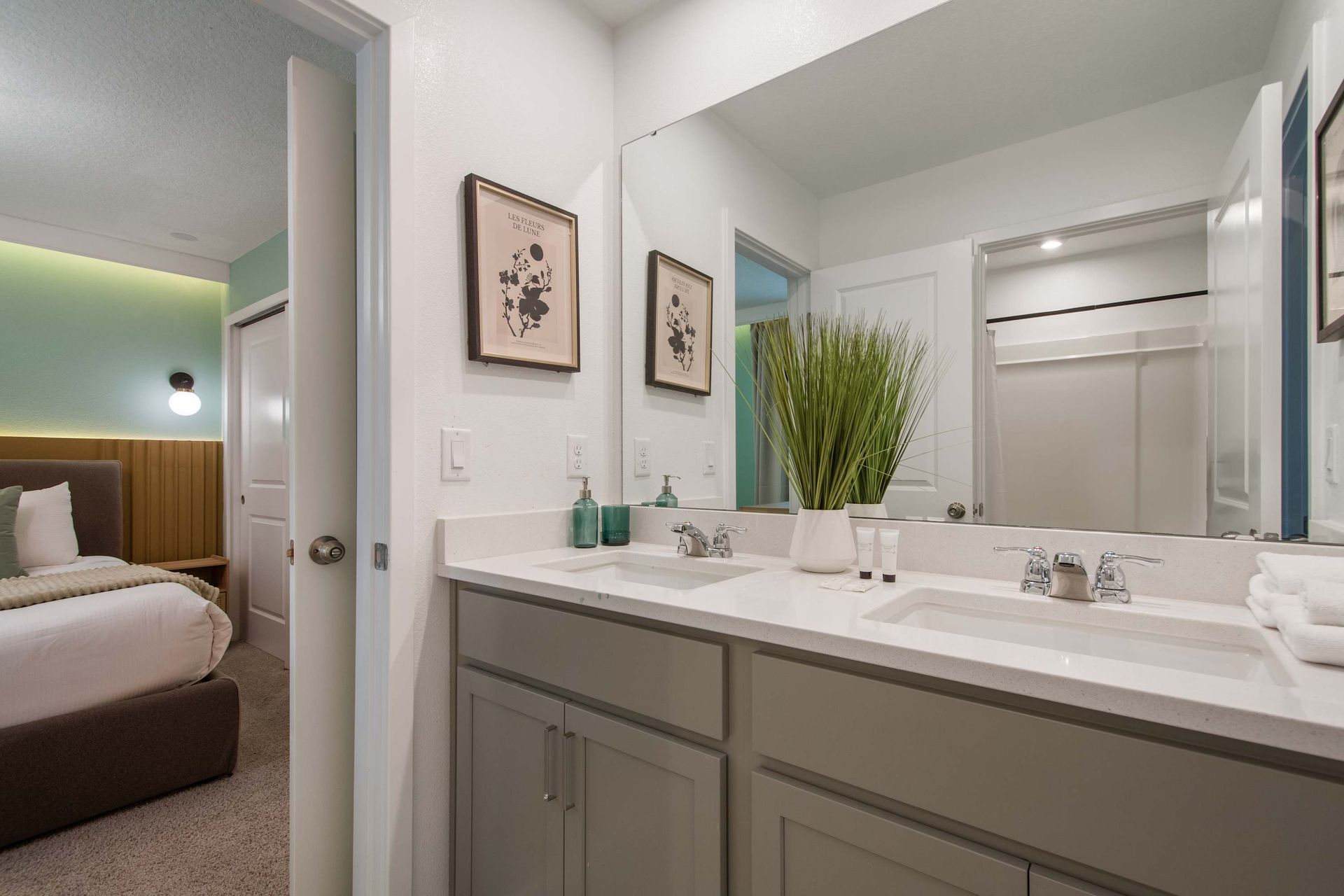 Jack-and-Jill Bathroom with Double Sinks, Modern Fixtures & Bedroom Access
