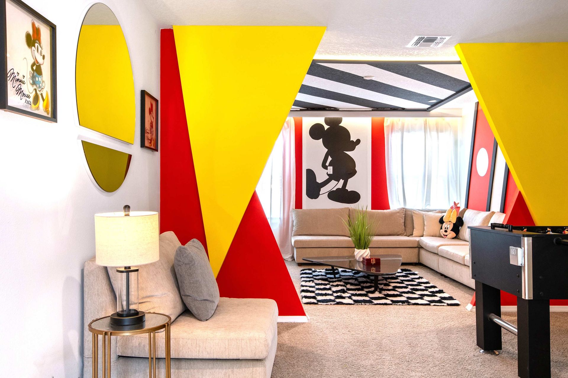 Mickey-Inspired Living Room with Bold Colors, Foosball, and Family Fun
