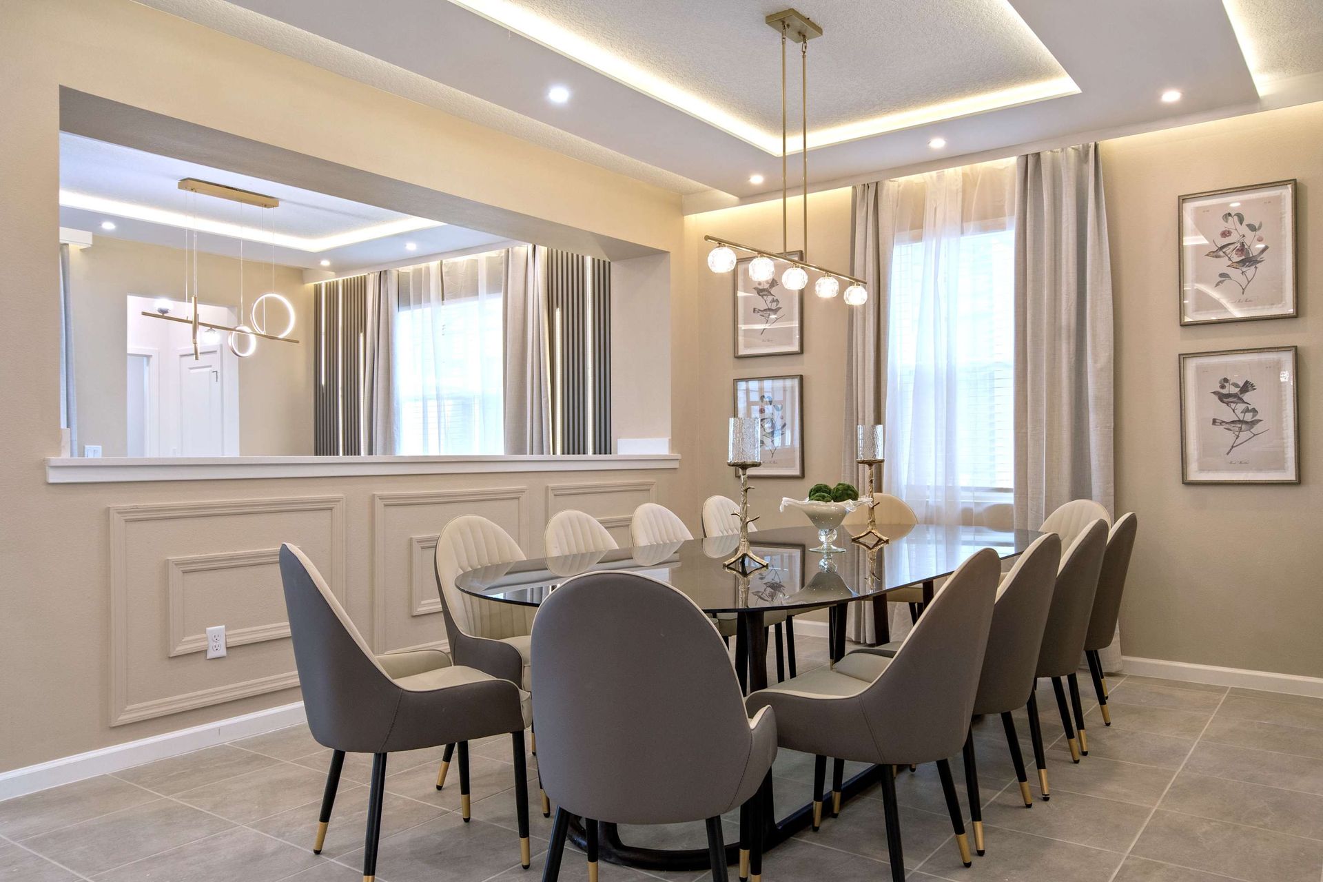 Elegant Dining Room with Seating for Ten, Modern Lighting, and Chic Decor
