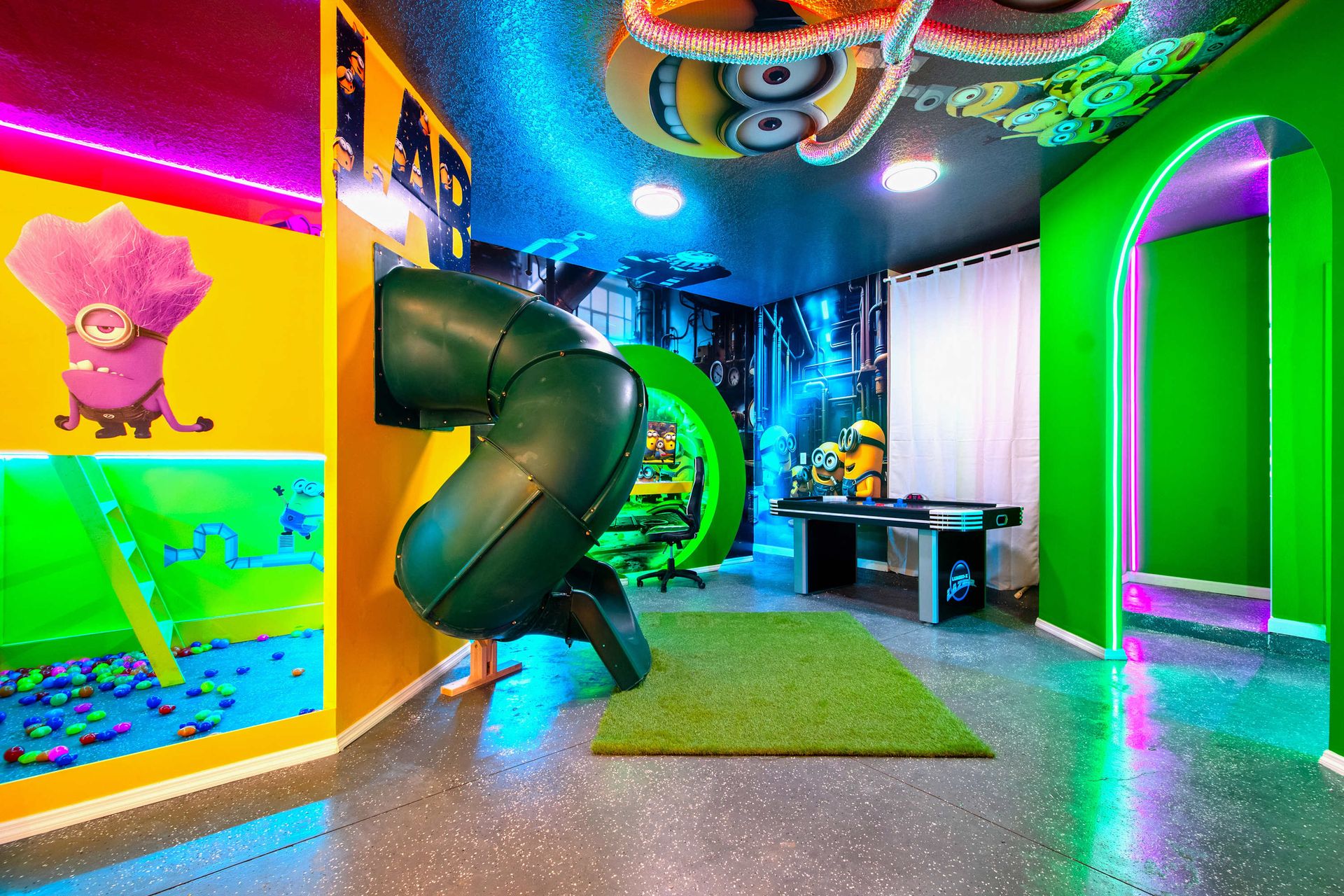 Minion-Themed Playroom with Spiral Slide, Climbing Wall & Vibrant Lighting
