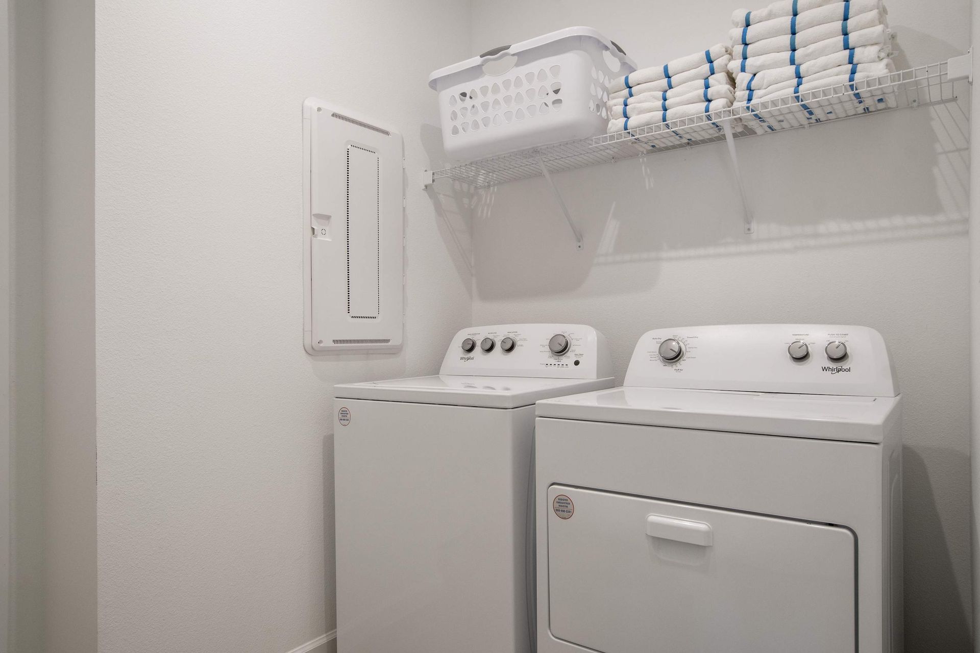Convenient In-Home Laundry Room with Washer, Dryer & Overhead Storage Shelf
