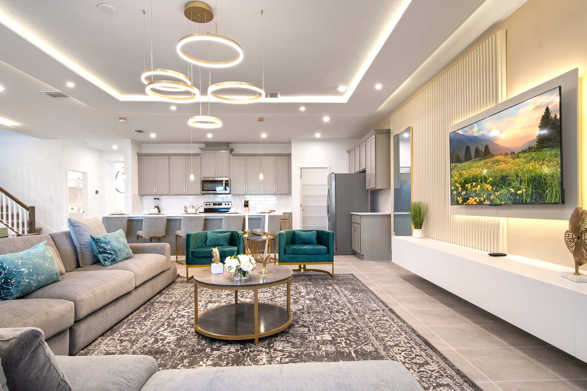 Modern Luxe Living Room with Open Kitchen, Smart TV, and Elegant Decor
