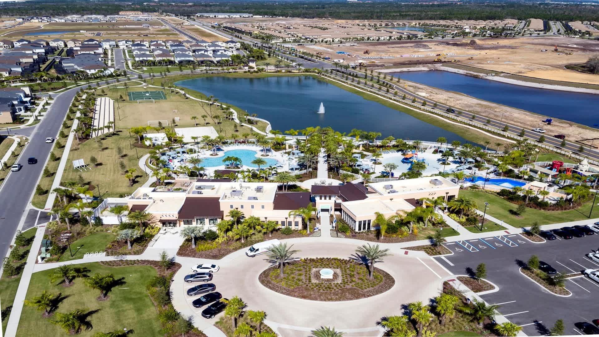 Resort-style community with pools, lake views, waterslides, and top-tier amenities.