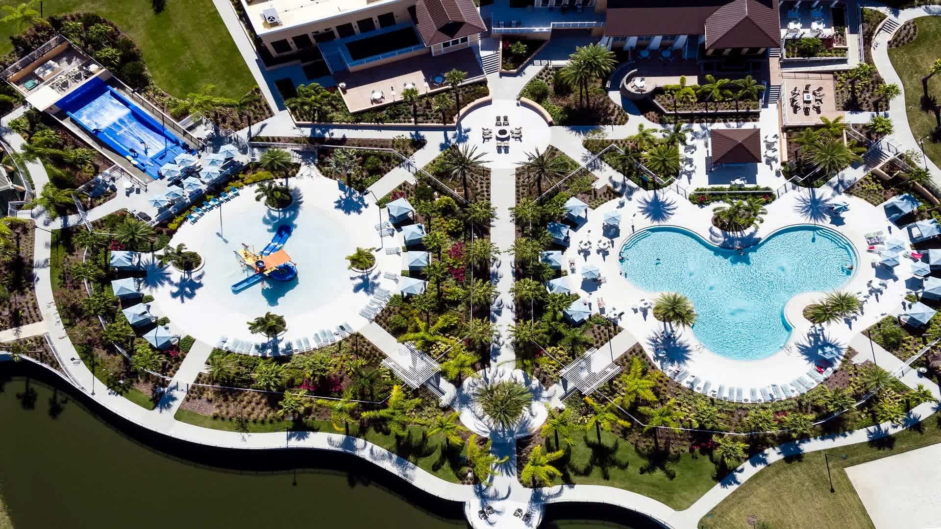 Luxury resort with pools, waterslides, and lush gardens for ultimate relaxation.