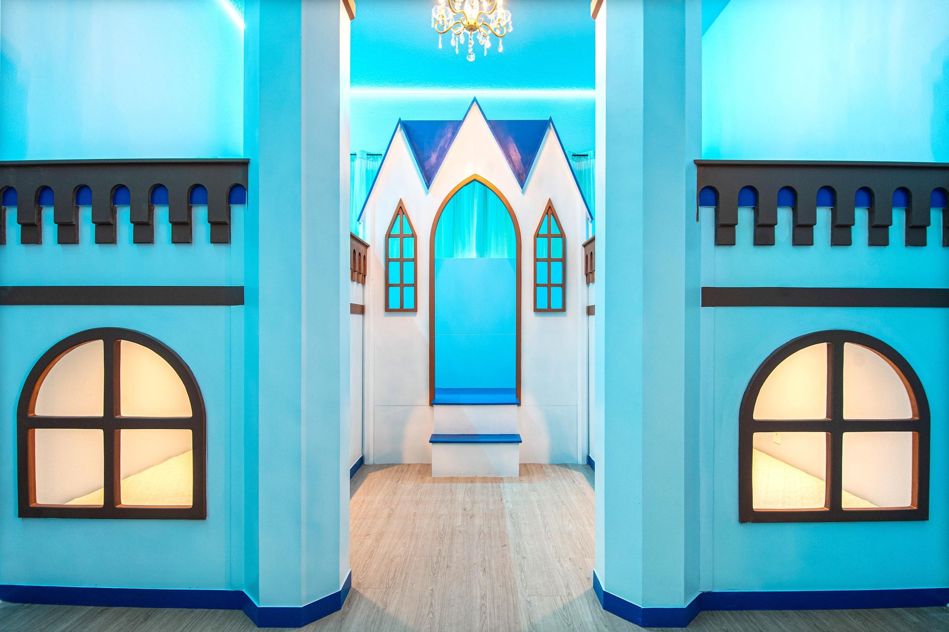 Magical princess-themed room with castle bunk beds and enchanting royal decor
