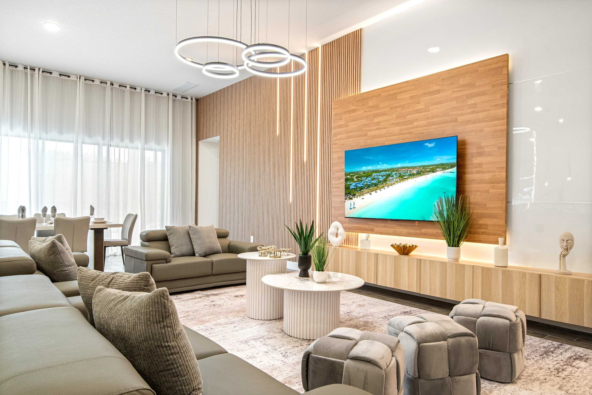 Modern luxury living room with sleek design, cozy seating, and elegant decor accents.
