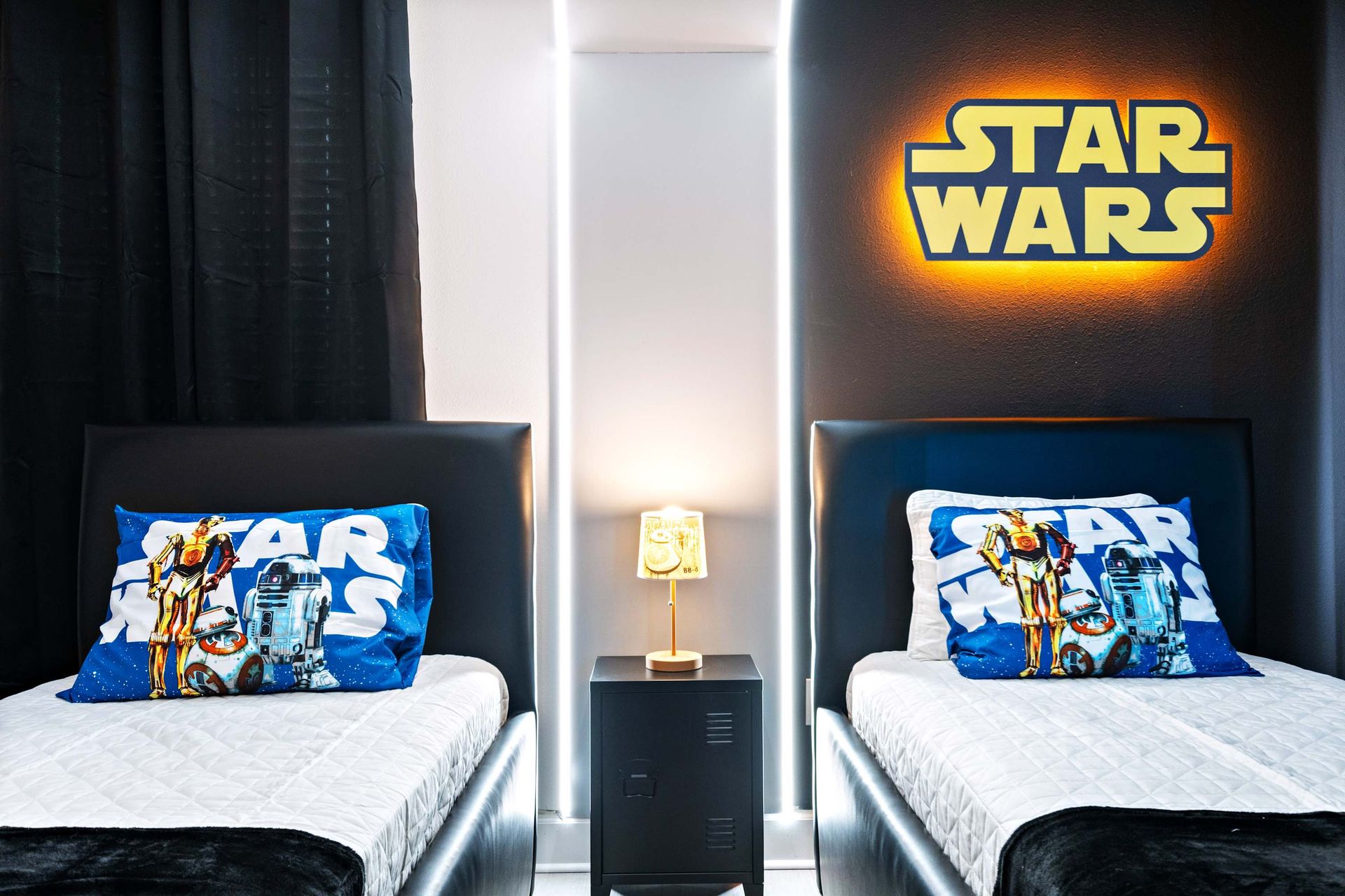 Galactic twin bedroom with glowing Star Wars theme and cozy space adventure vibes
