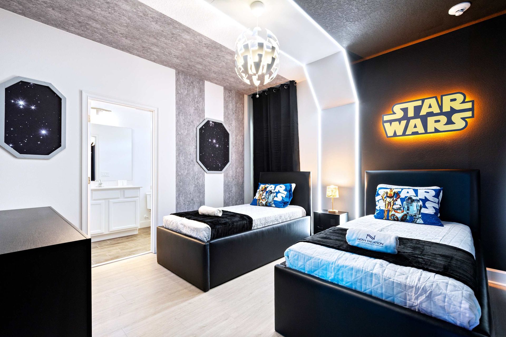 Galactic twin bedroom with glowing Star Wars theme and cozy space adventure vibes
