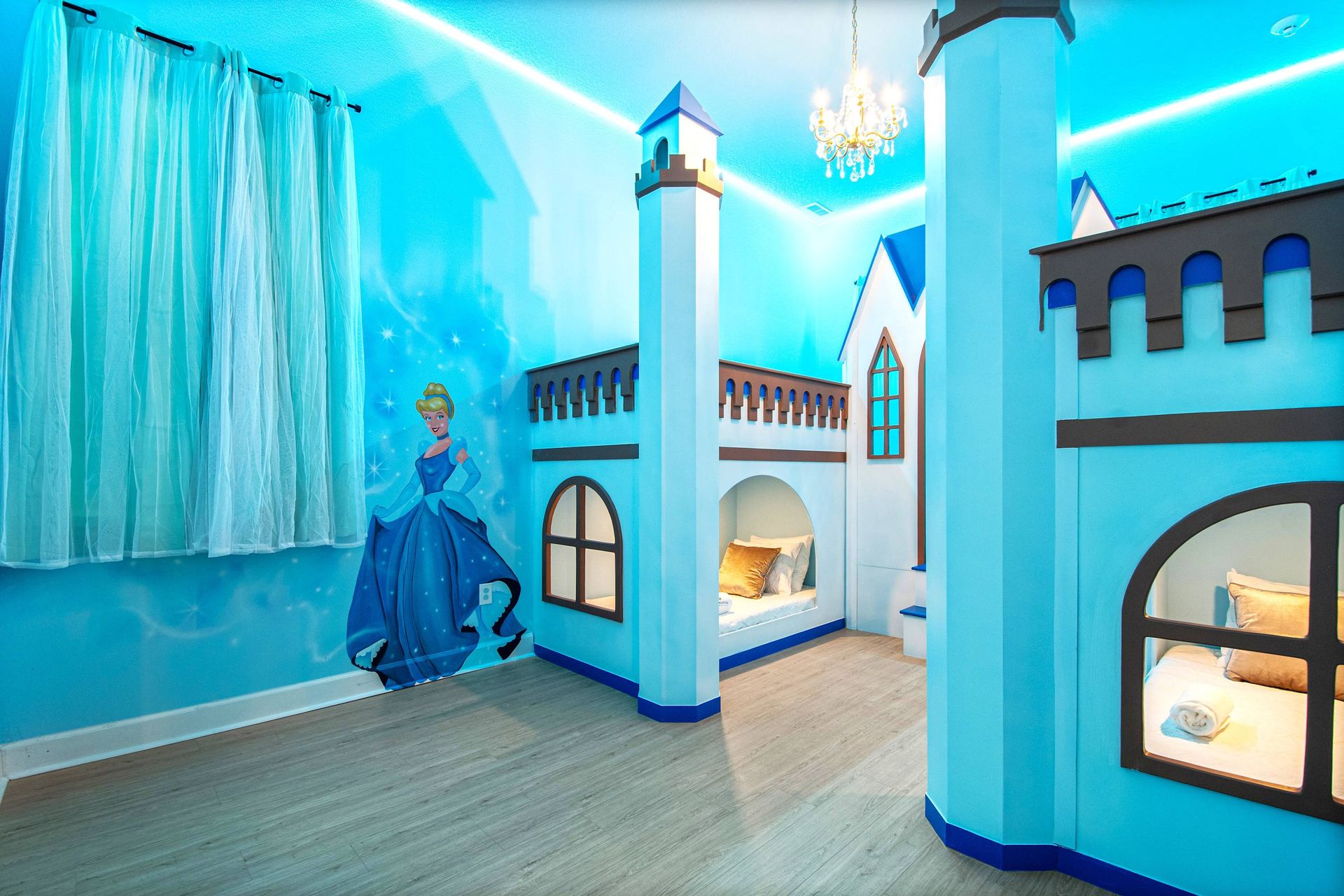 Magical princess-themed room with castle bunk beds and enchanting royal decor
