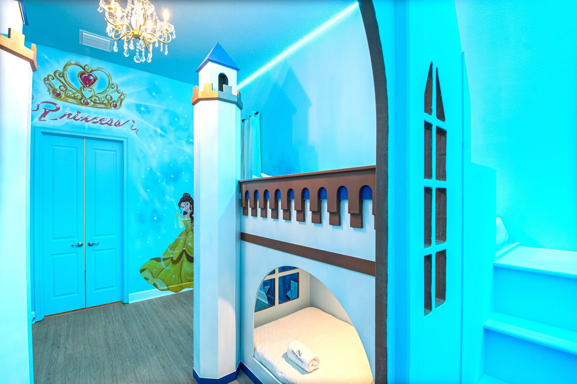 Magical princess-themed room with castle bunk beds and enchanting royal decor
