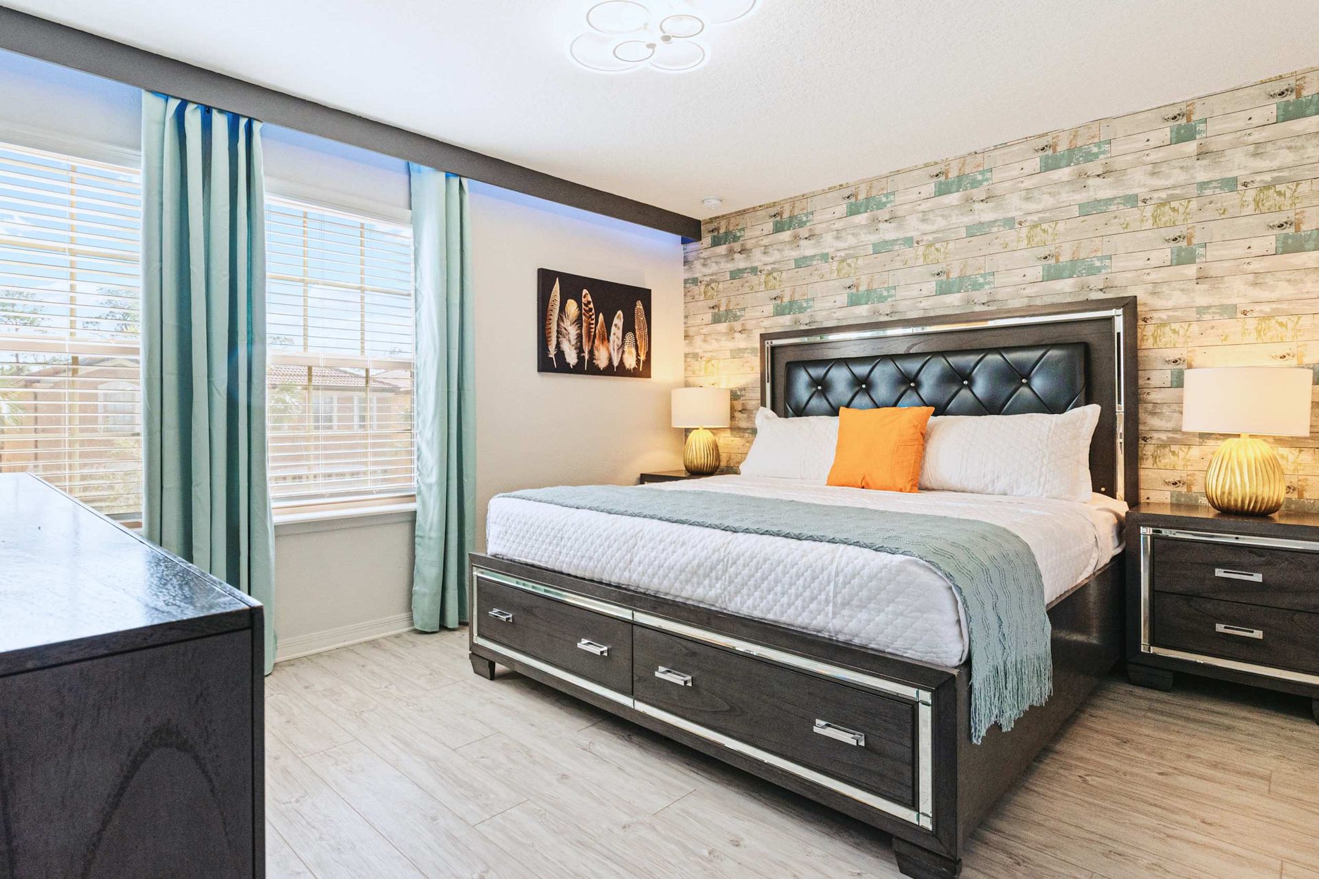 Cozy king suite with rustic wood accents, plush bedding, and a modern flair.