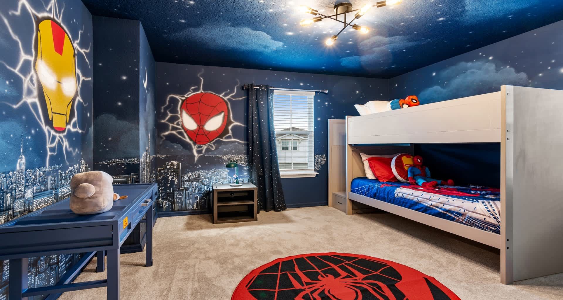 Superhero-themed kids’ room with Spider-Man bunk beds and Iron Man wall art!
