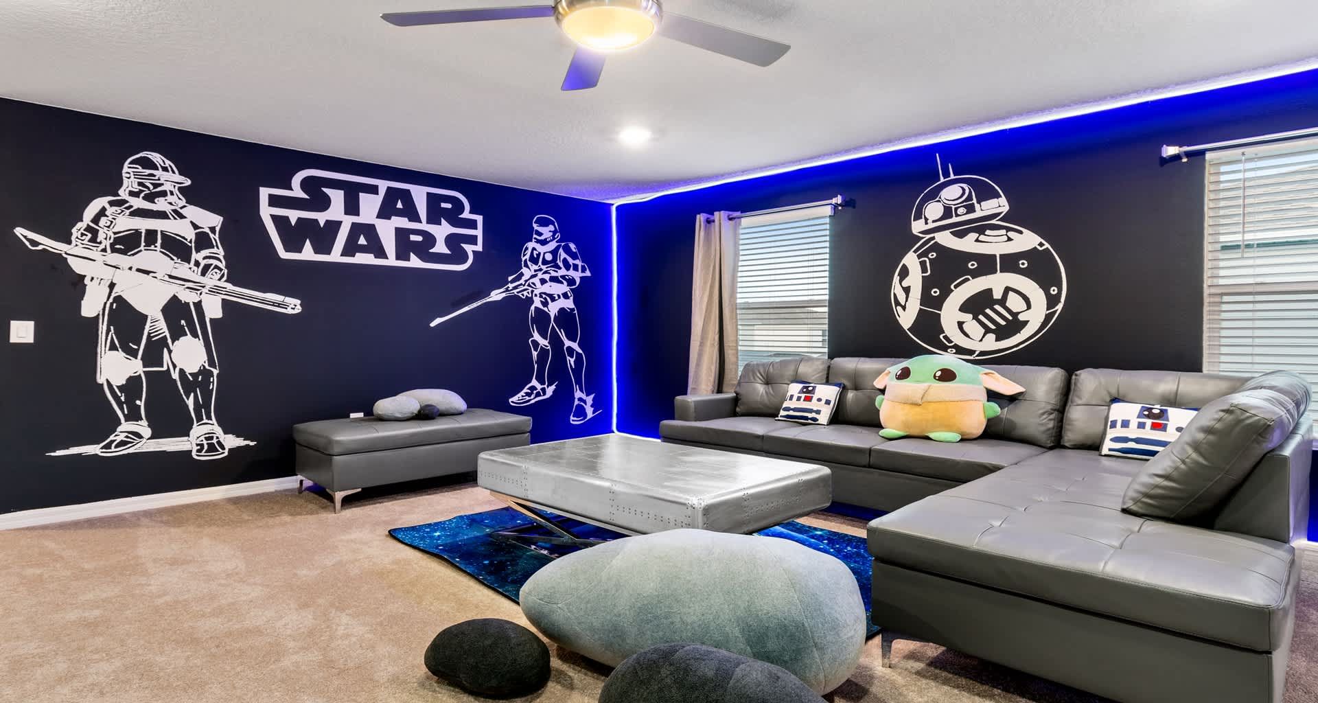 Star Wars lounge with galactic murals, plush seating, and out-of-this-world vibes!

